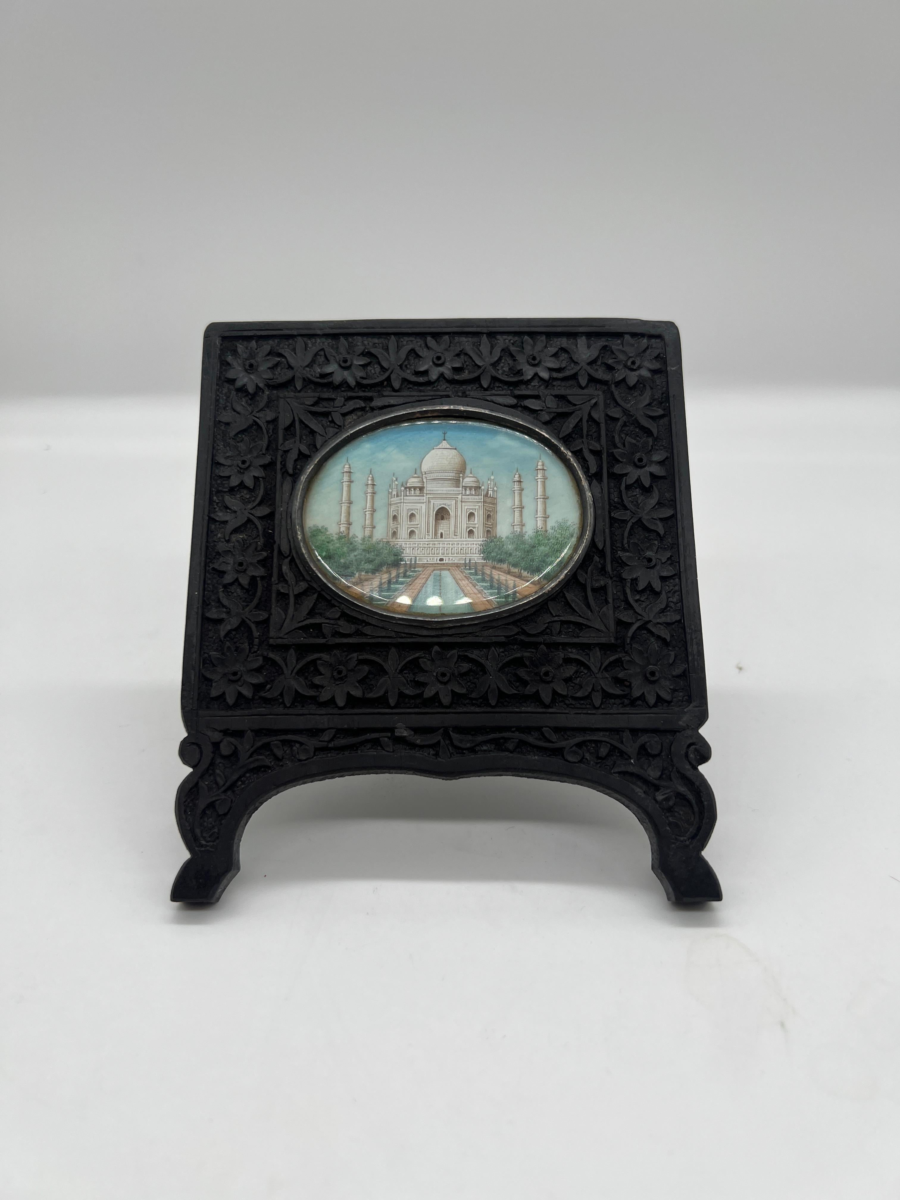 Embark on a journey through time with this extraordinary antique Anglo-Indian Grand Tour Era Miniature Taj Mahal Painting, nestled within a beautifully carved rosewood frame. Dating back to a bygone era of exploration and cultural exchange, this