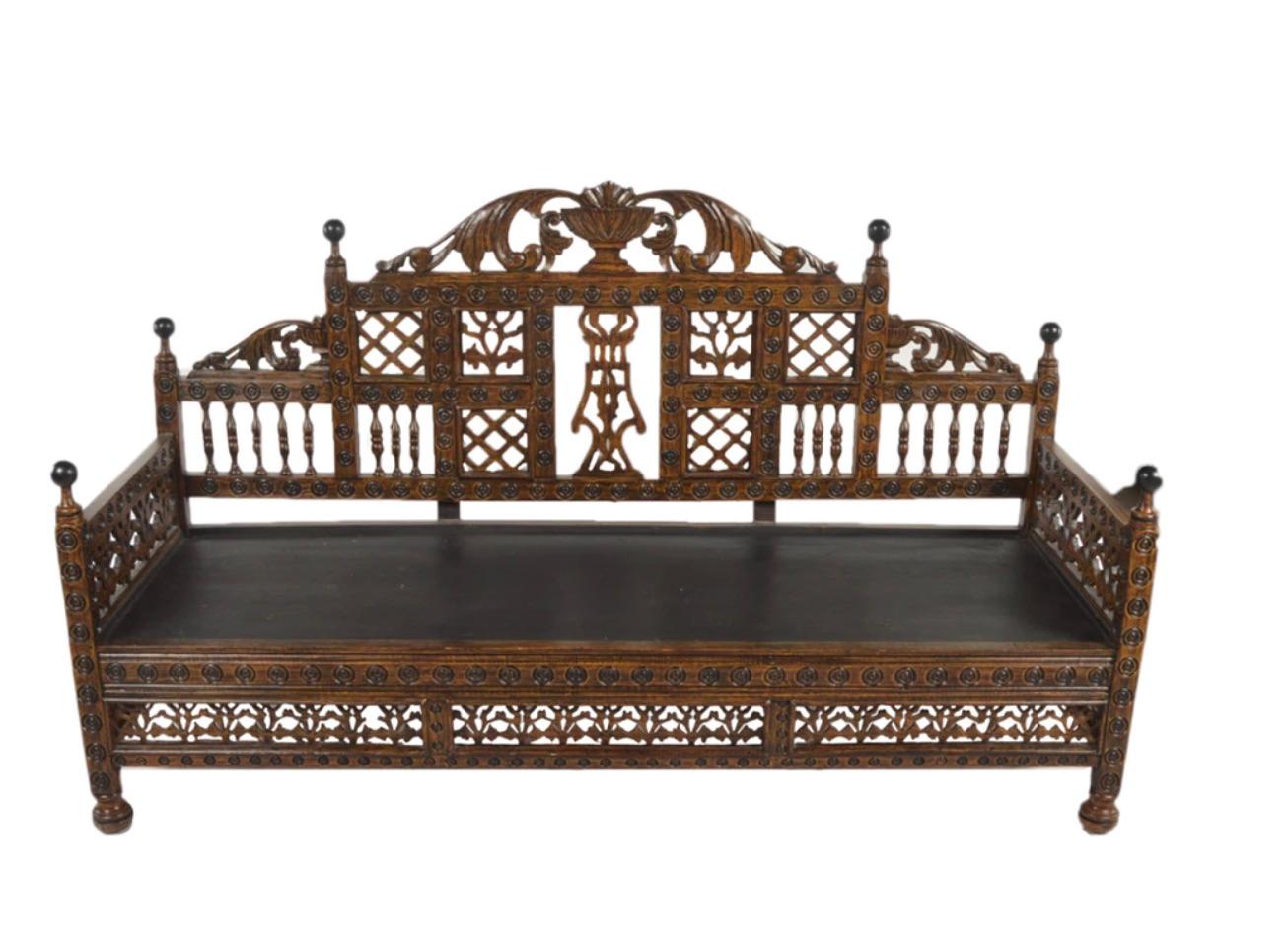  Gorgeous Anglo Indian, Moroccan style sofa with a beautiful subtle Moorish design upholstery,  designed for Royalty!

The Sofa Settee is beautiful and highly decorative- a shaped crest rail with carved embellishments featuring urn and acanthus leaf