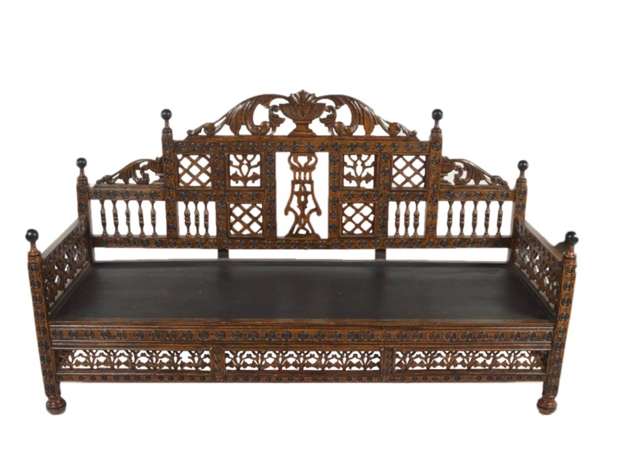  Gorgeous Anglo Indian, Moroccan style sofa with a beautiful subtle Moorish design upholstery,  designed for Royalty!

The Sofa Settee is beautiful and highly decorative- a shaped crest rail with carved embellishments featuring urn and acanthus leaf