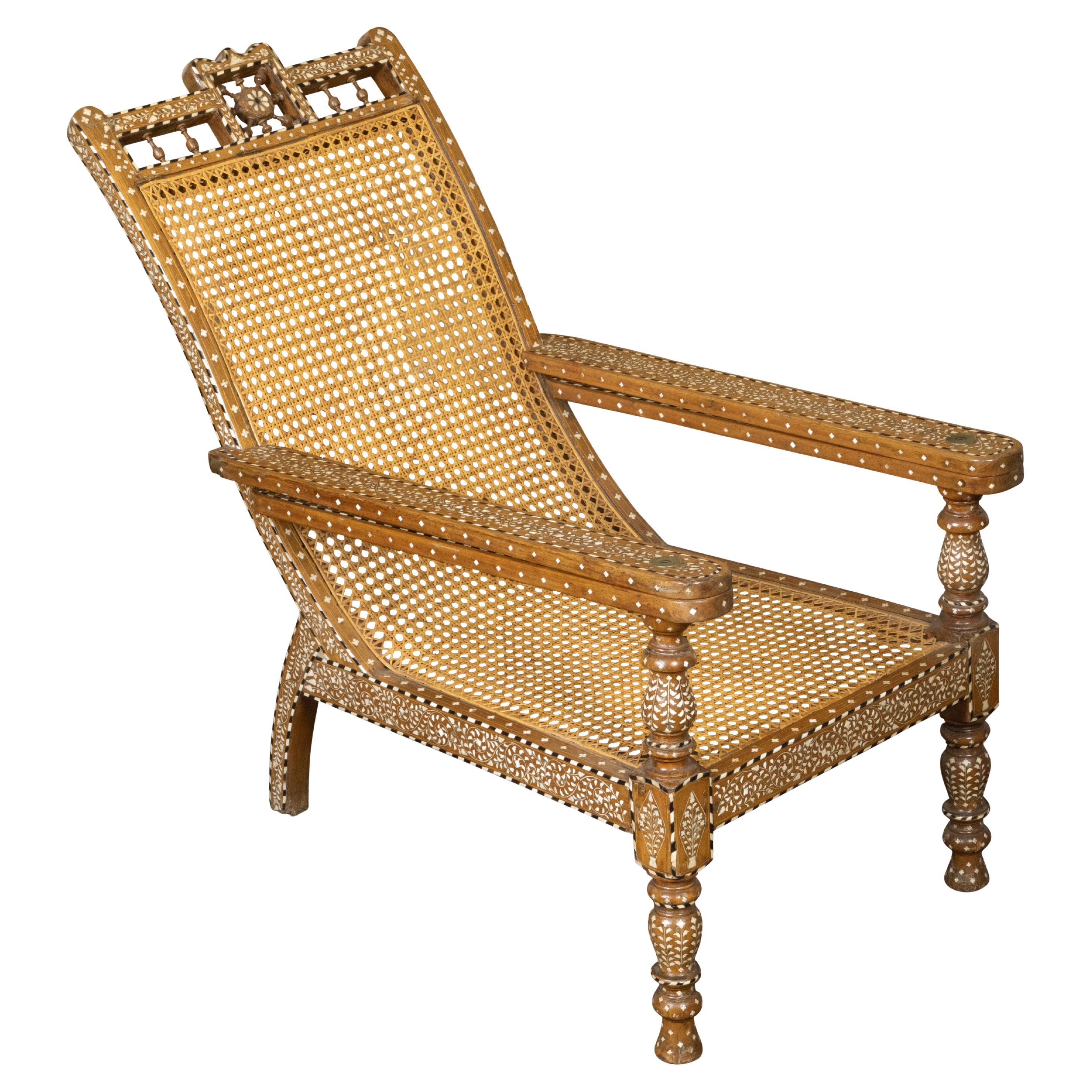 Anglo-Indian Inlaid Plantation Chair with Scrolling Foliage and Extending Arms For Sale