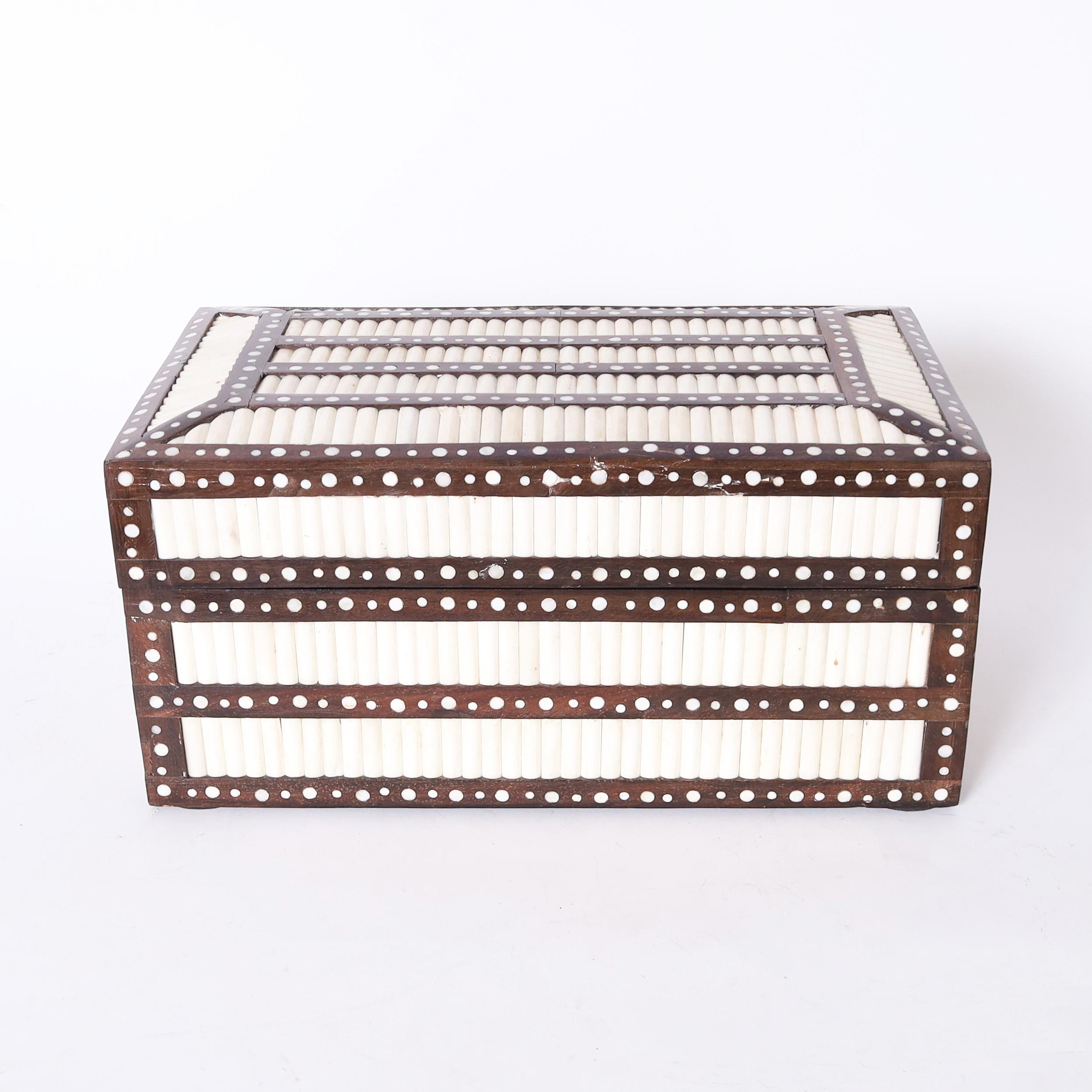 Lofty Anglo Indian hinged box handcrafted in mahogany and decorated with porcupine quills and inlaid bone dots.