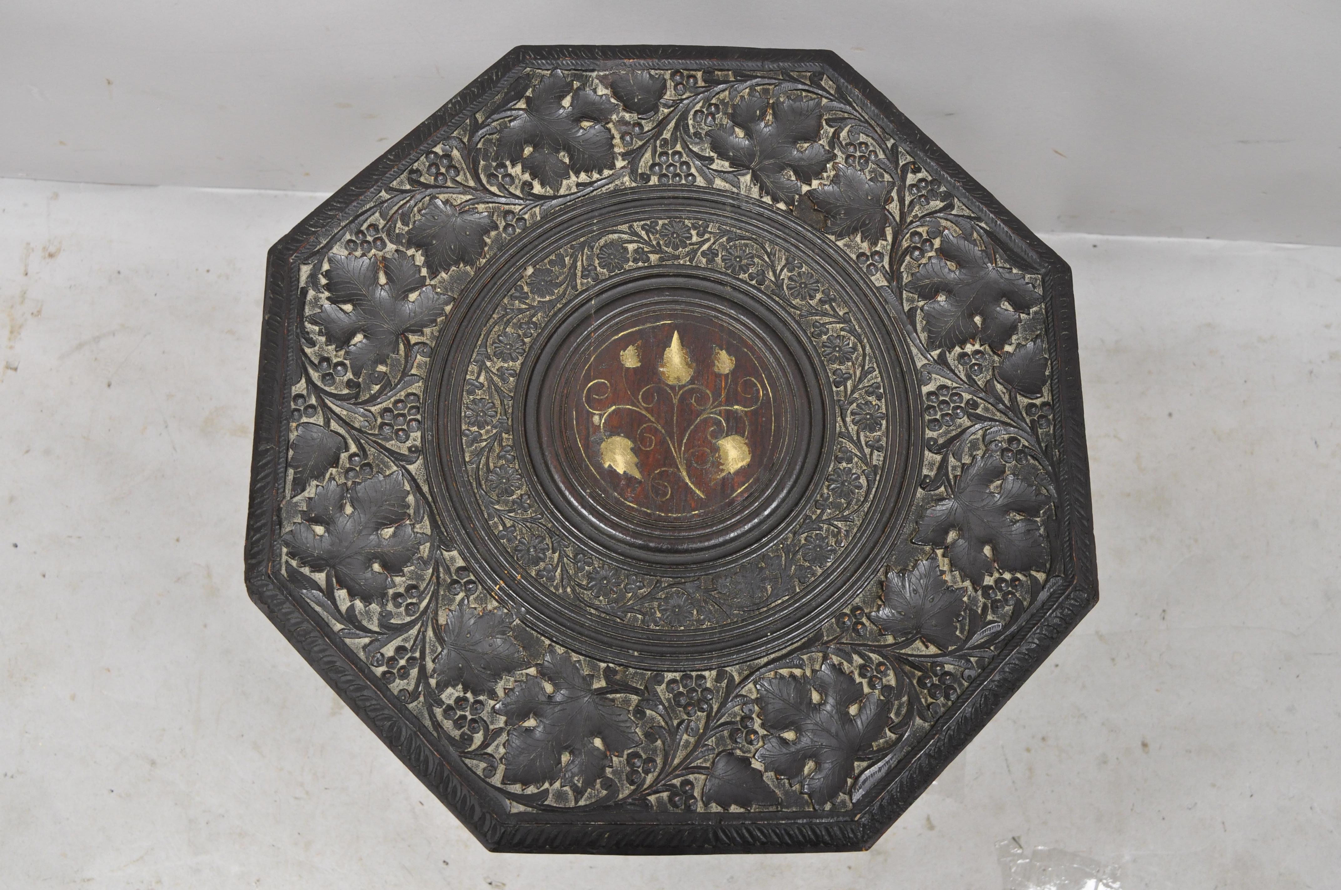 Antique Anglo-Indian Mediterranean brass inlay maple vine carved accent side table. Item features brass floral inlay, hand carved maple leaf and vine carvings, ornately carved throughout, remarkable patina, solid wood construction, very nice antique