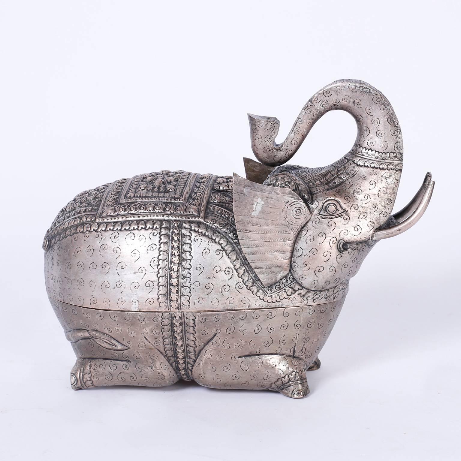 Folky silvered metal elephant handcrafted with an amusing form while hammered, etched and inscribed. Unexpectedly opens as a trinket box.