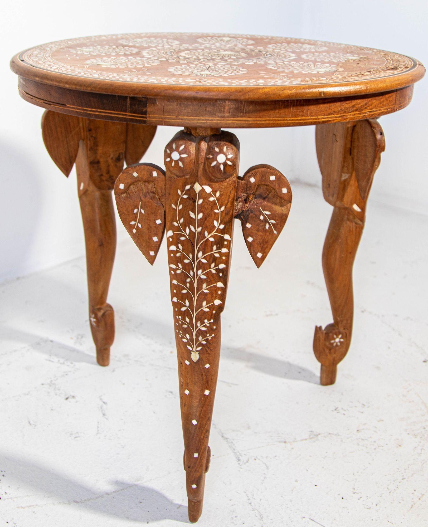 19th c, Anglo Indian Mughal Teak Inlaid Round Side Table.
Antique 19th c. Anglo Indian Mughal teak inlaid side table.
Fine and elegant Moorish round side table hand carved with bone inlaid elaborate peacock design.
With elephant inlaid bone