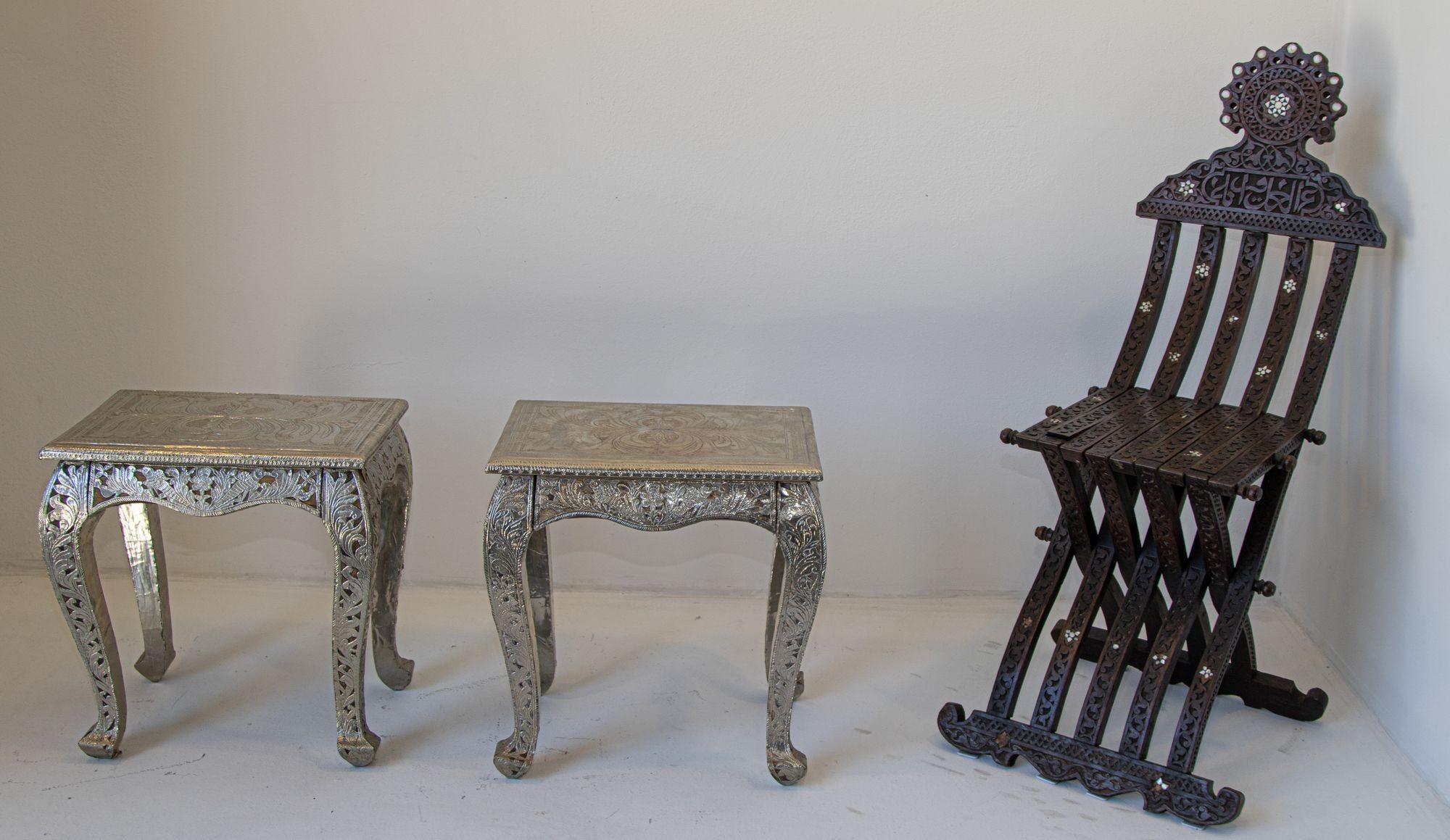 Anglo Indian night stand silver clad a pair.
Vintage Anglo-Indian silver wrapped clad side low tables, night stands or occasional table with a drawer.
Anglo Raj side low table hand-hammered with silver metal repousse work over wood very nice and