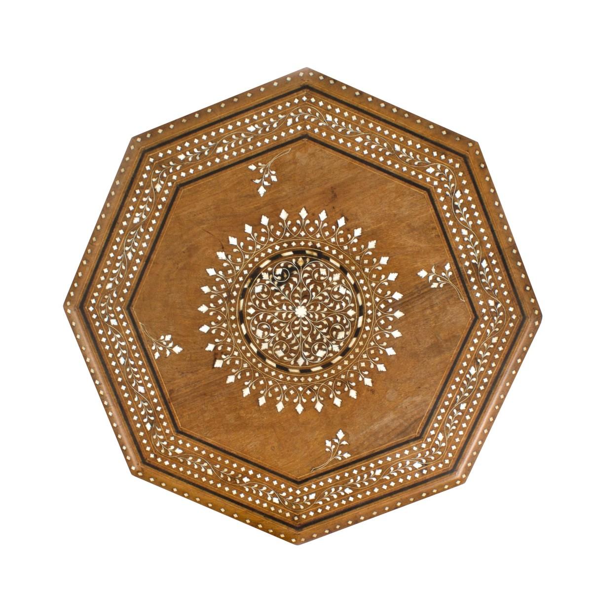 An Anglo-Indian folding octagonal side table featuring an inlaid design, circa 1950.