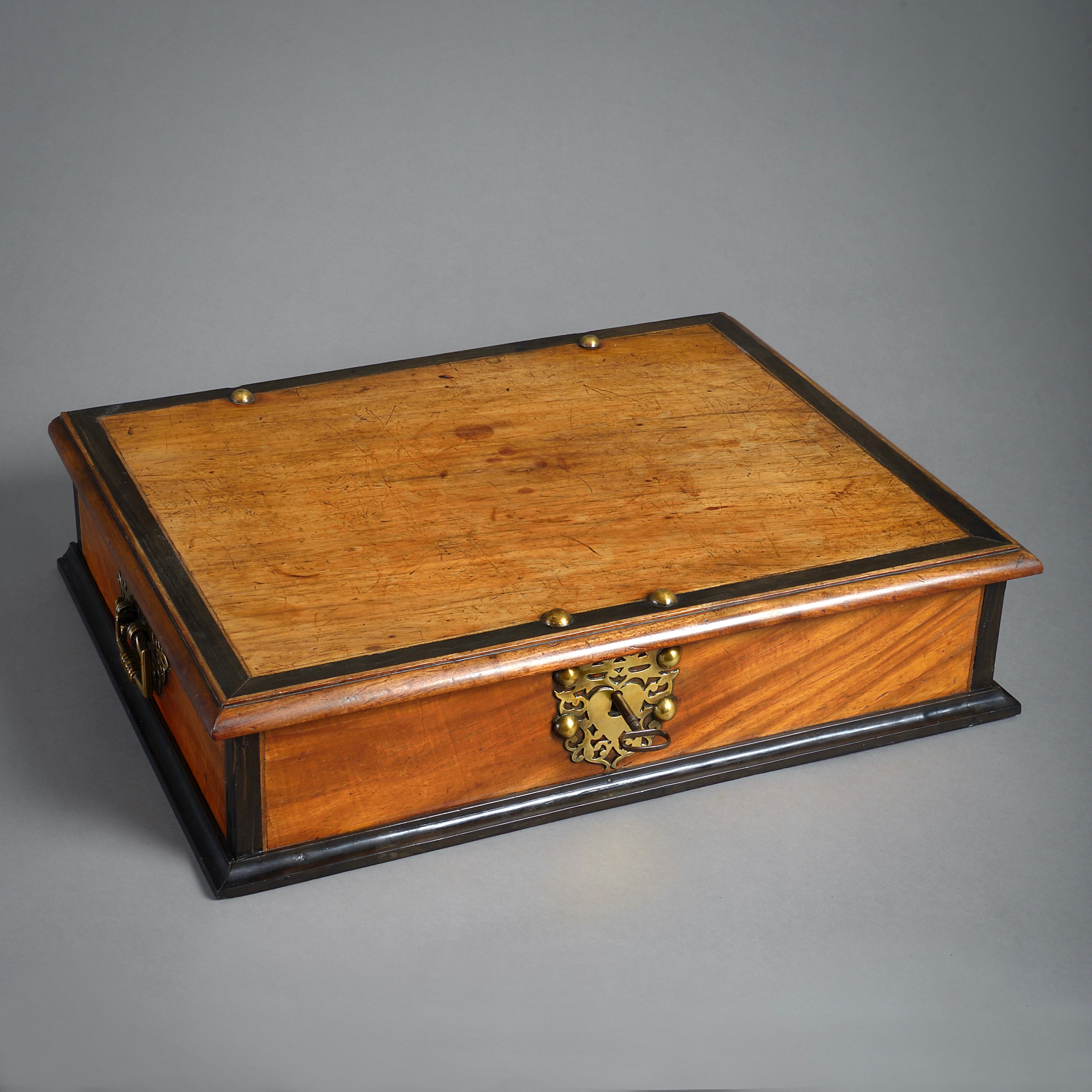 An Anglo-Indian brass-mounted padouk and ebony box, Ceylon, second half of the 18th century.