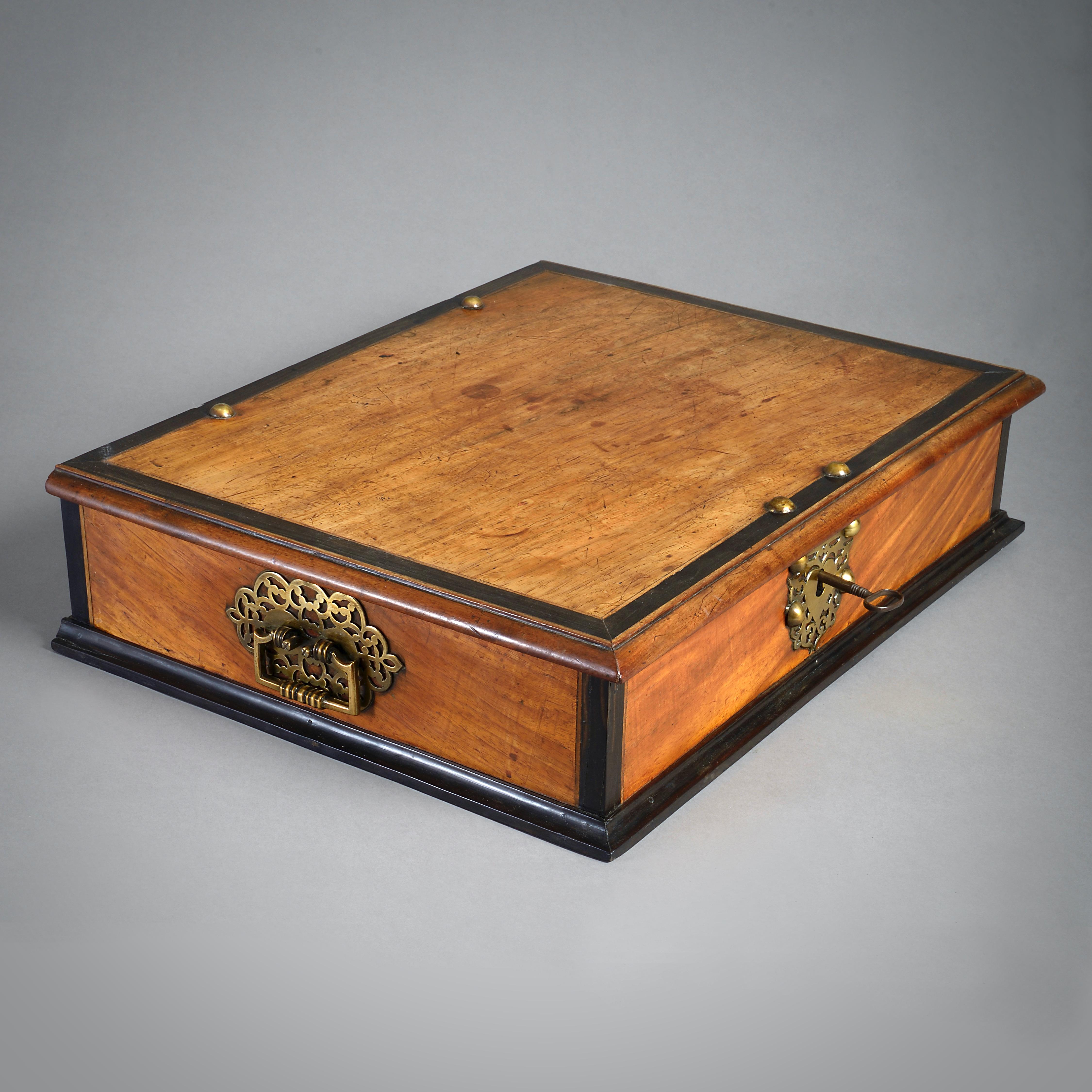 An Anglo-Indian brass-mounted padouk and ebony box, Ceylon, second half of the 18th century.