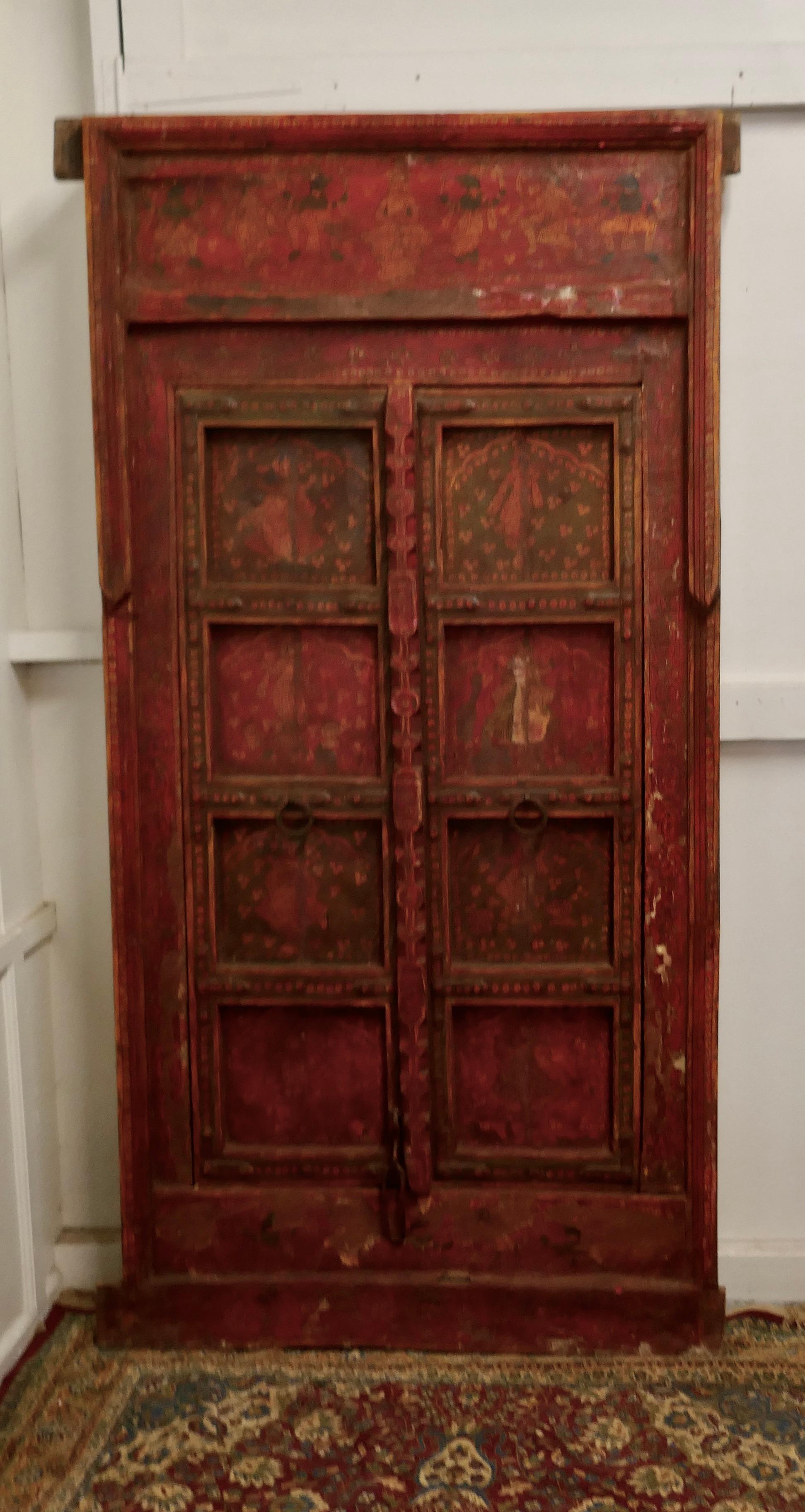 Anglo Indian painted doors in original frame, wall art

These beautiful wooden doors would look fabulous on a wall as decoration or relocated in a doorway
The panelled doors come in their original Carved Frame they have been fixed in the closed