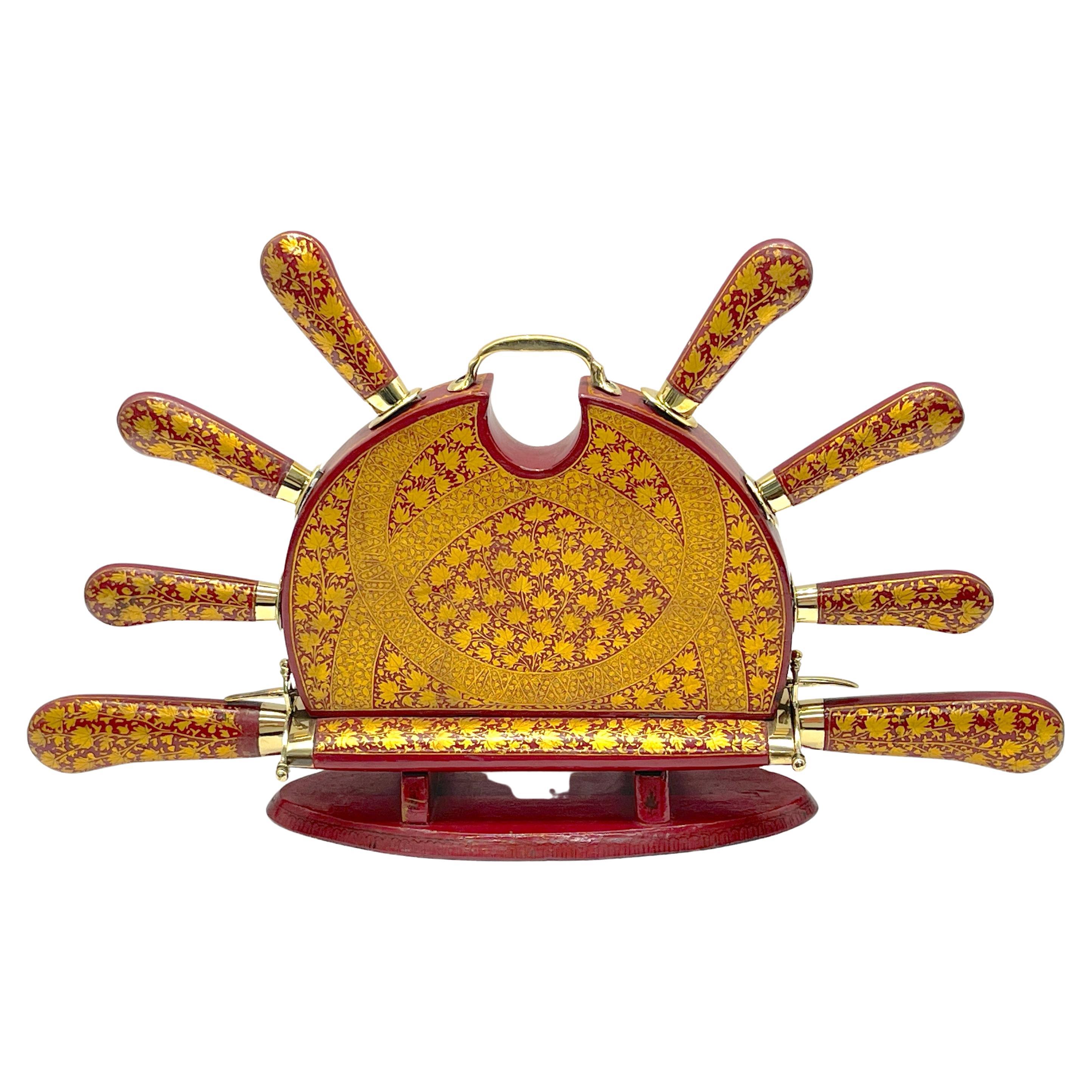Anglo-Indian Red and Gilt Lacquer and Brass Carving Set For Sale