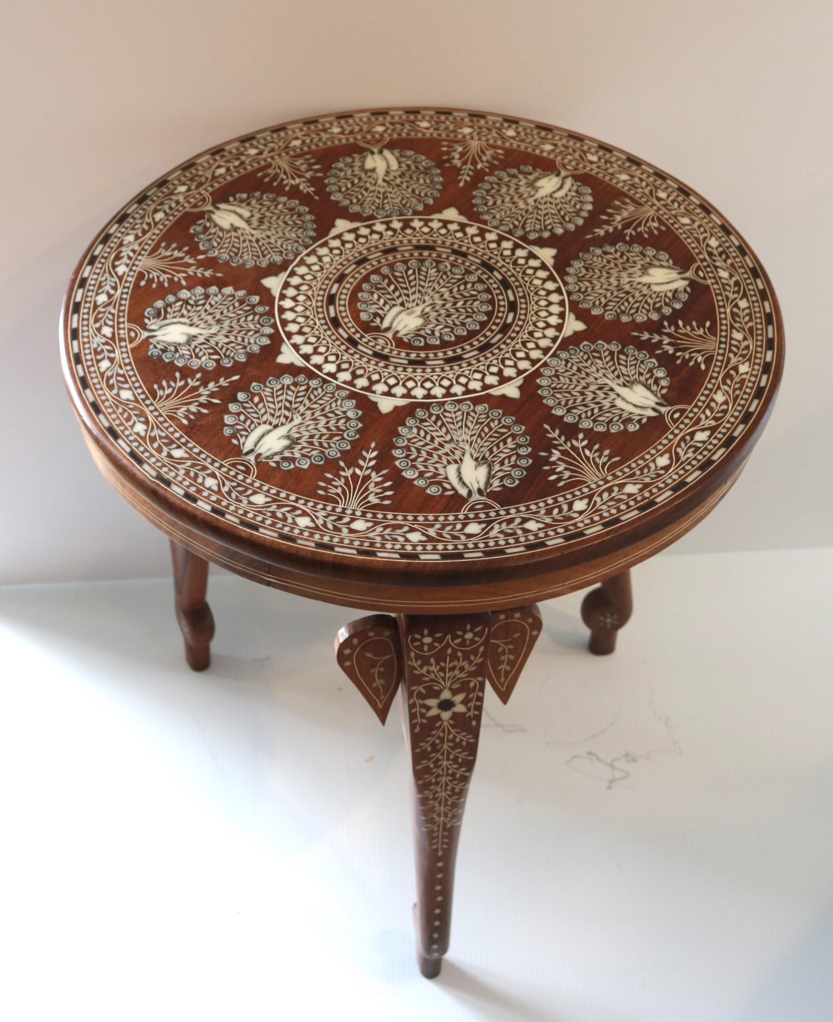 An inspired fine rosewood Anglo-Indian Moorish inlay highly decorative side tables with elephant form legs. Buy one or pair.
late 19th-early 20th century
The tables have circular tops with three legs each, each leg is carved as India elephants