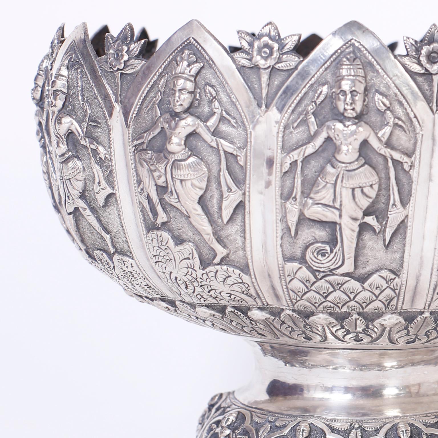 Antique Anglo-Indian fruit bowl hand chased with dancing deities in Gothic style arches.