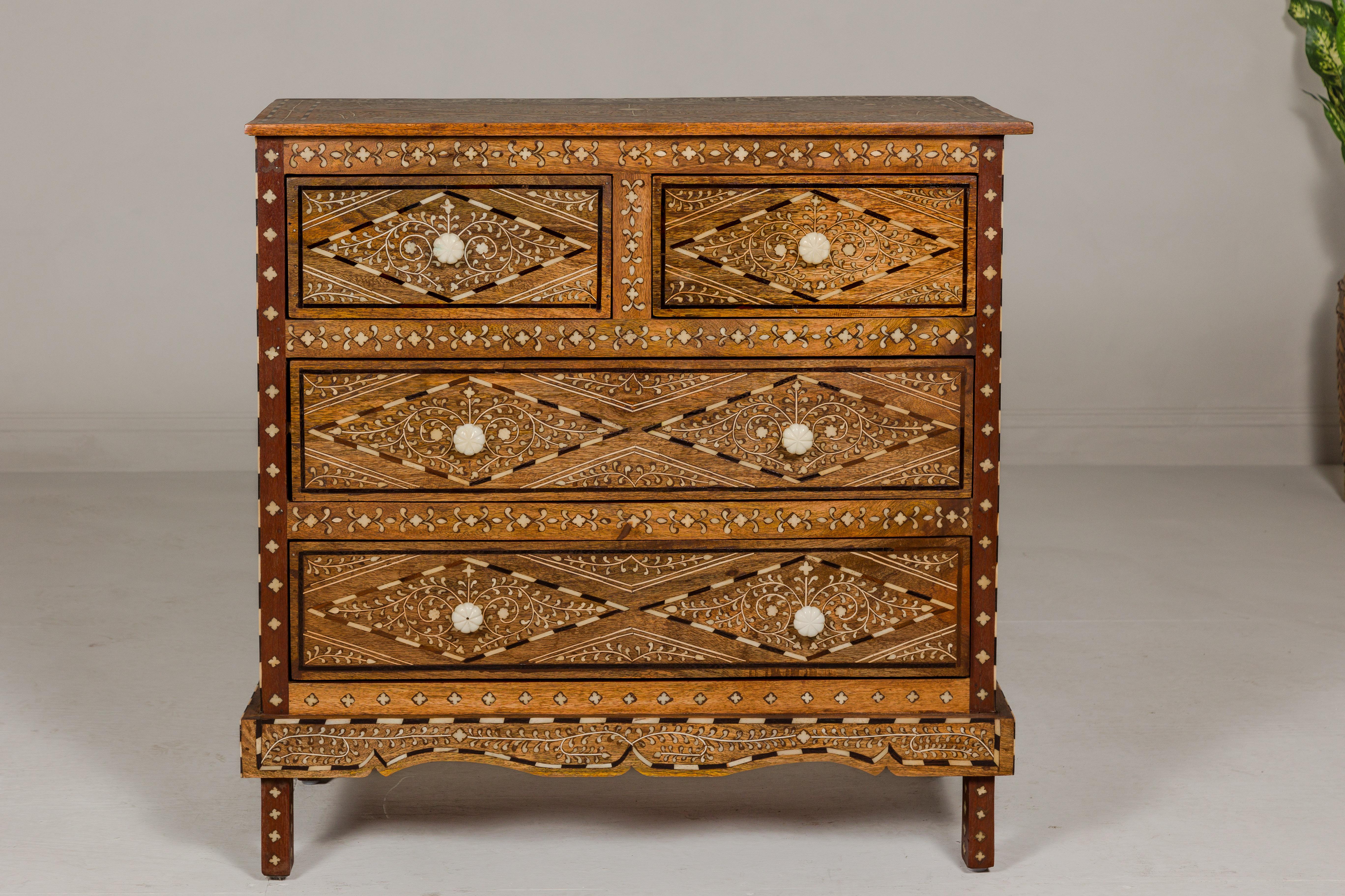 Carved Anglo-Indian Style Mango Wood Four-Drawer Chest with Foliage Bone Inlay For Sale