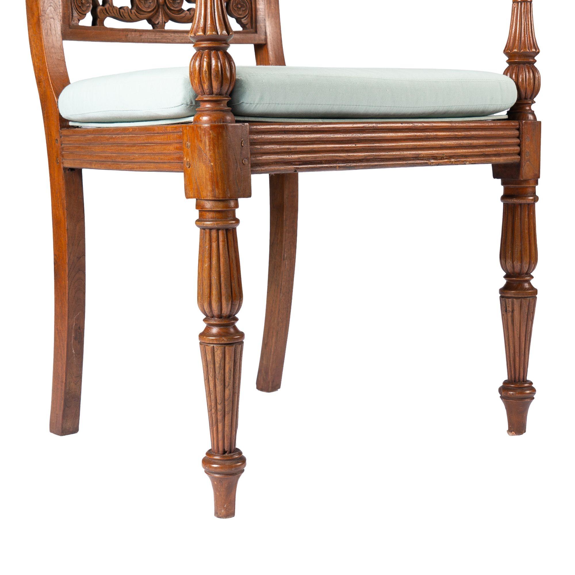 Anglo-Indian teak arm chair with caned seat and cushion, 1900-50 5