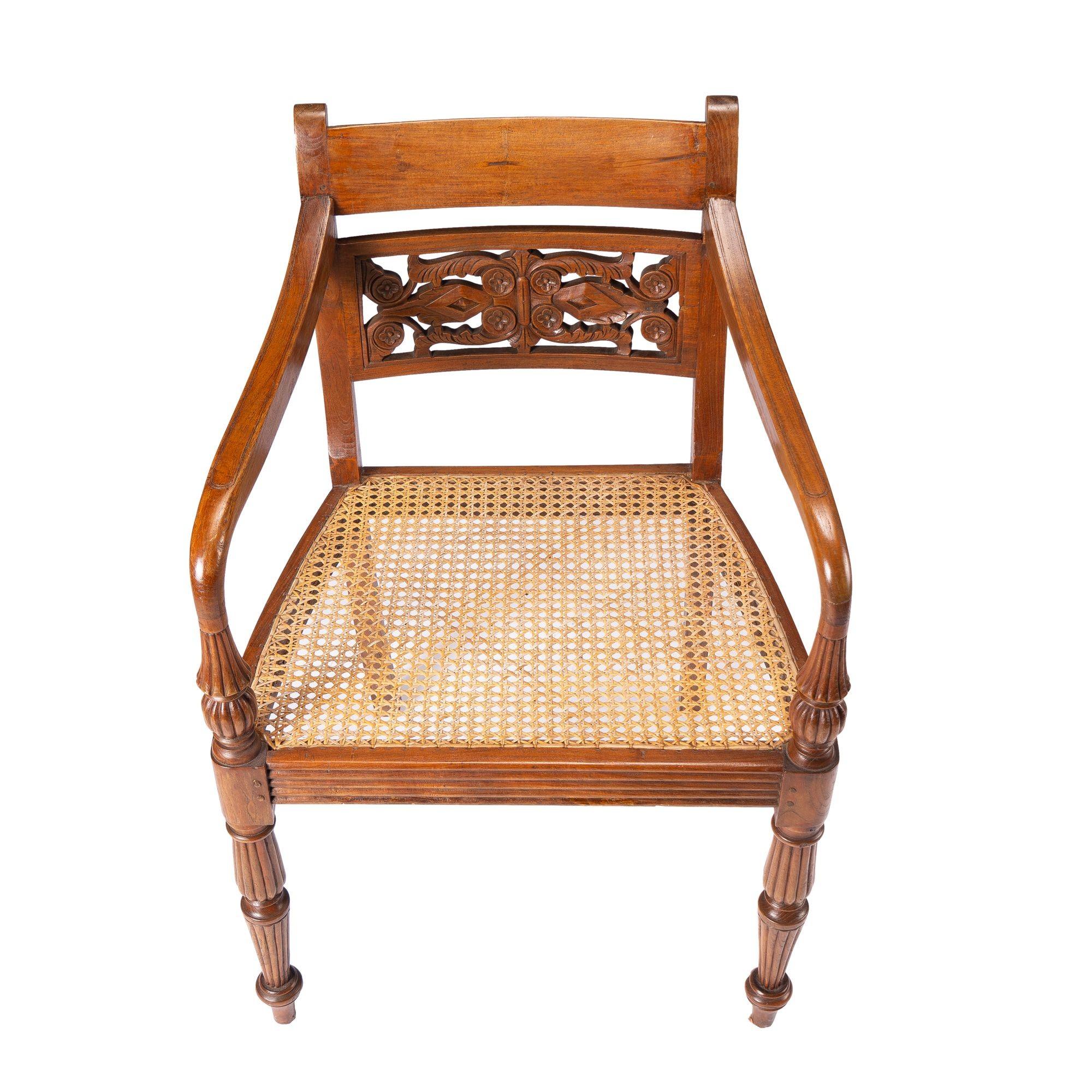 Anglo-Indian teak arm chair with caned seat and cushion, 1900-50 8
