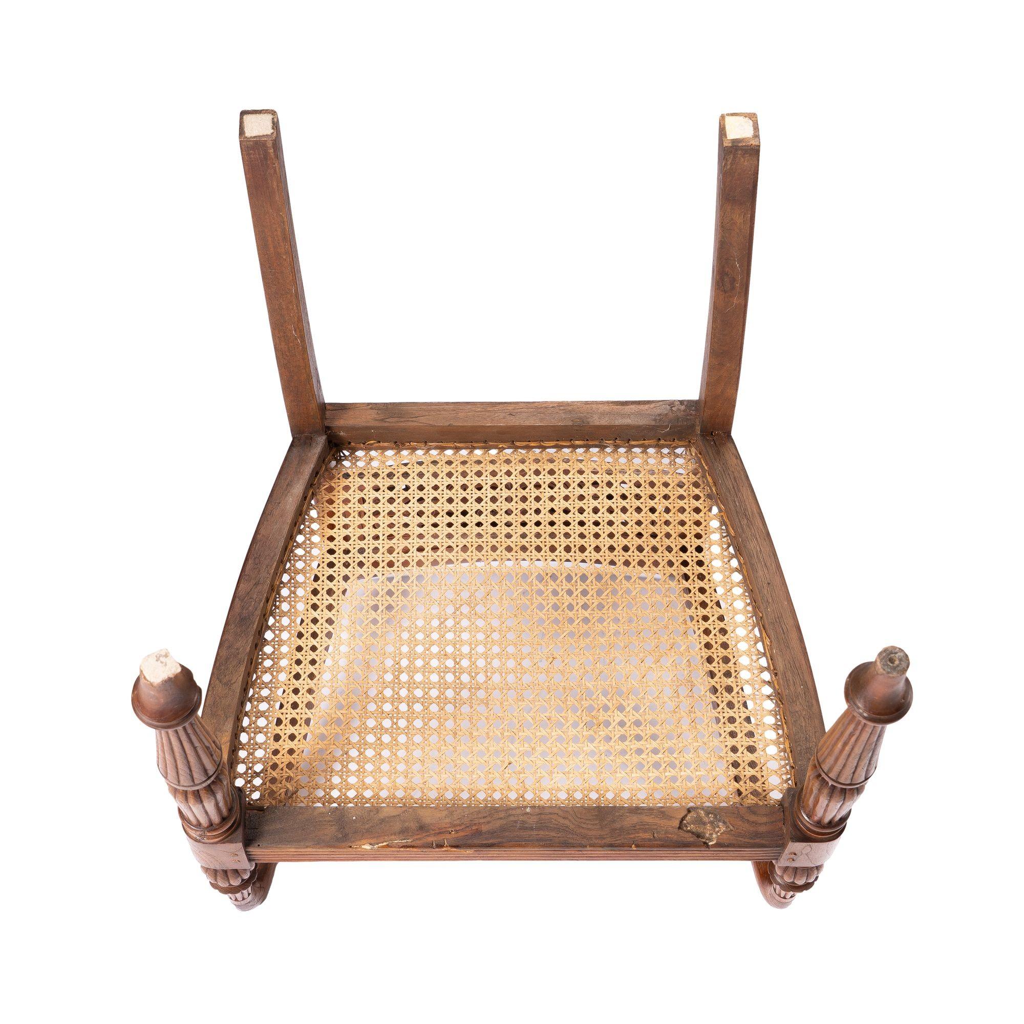 Anglo-Indian teak arm chair with caned seat and cushion, 1900-50 10