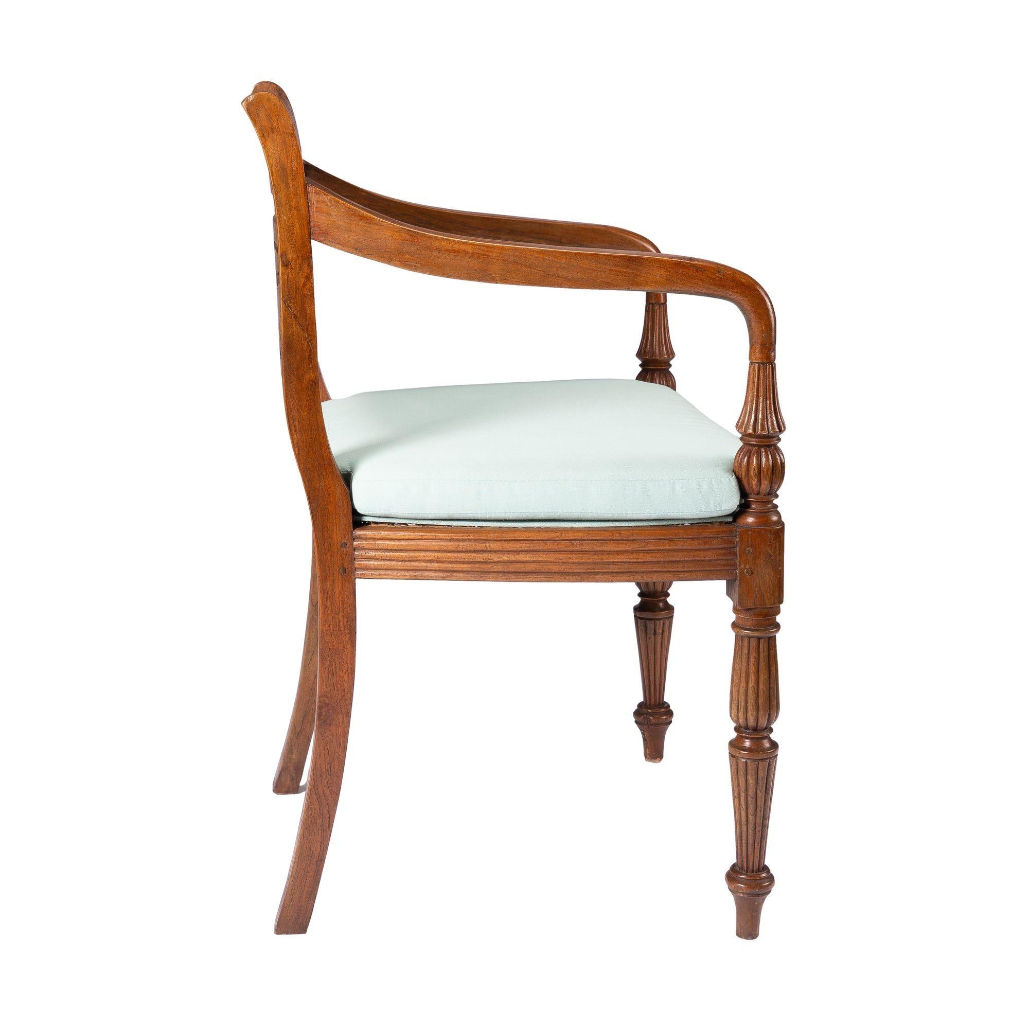 Upholstery Anglo-Indian teak arm chair with caned seat and cushion, 1900-50