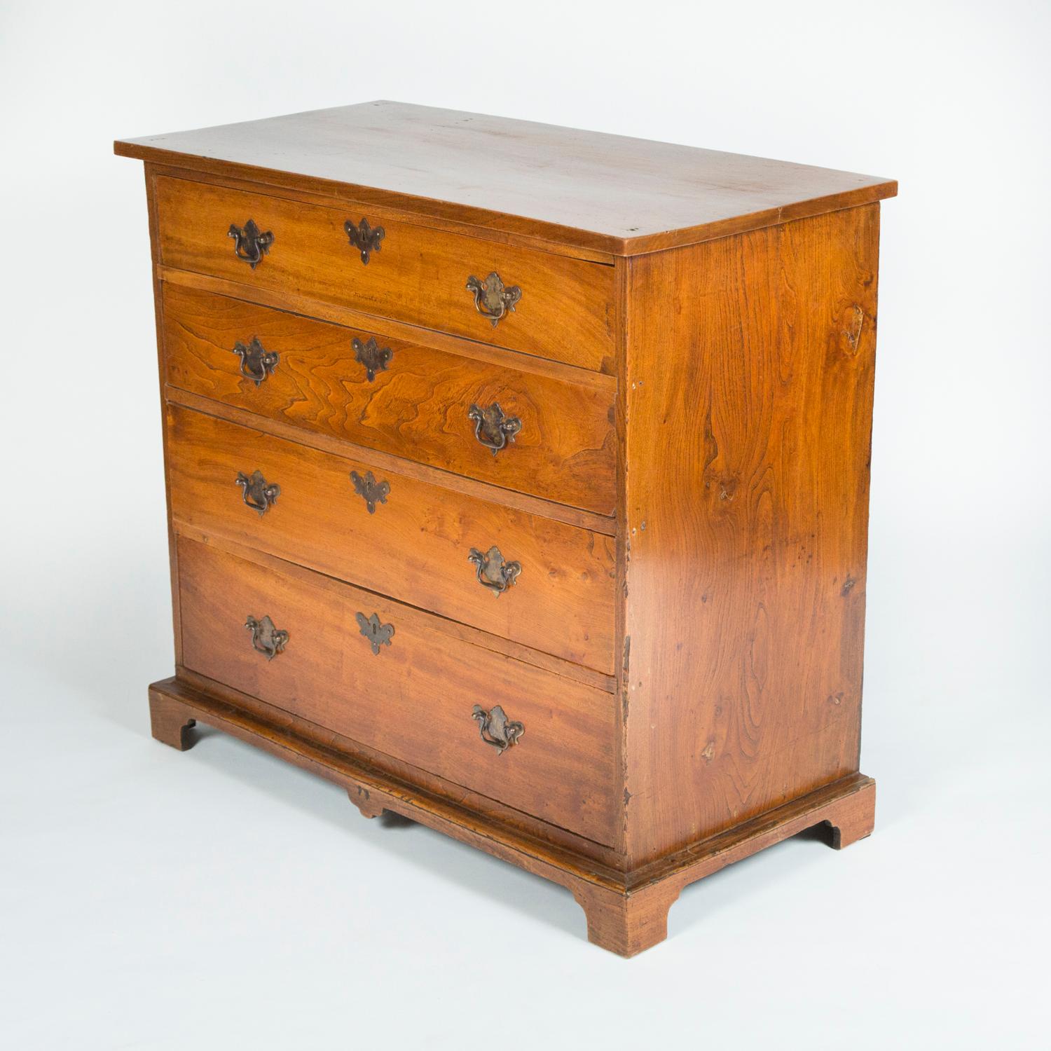 An Anglo-Indian teak 4 drawer chest of drawers with iron handles and escutcheons, circa 1910.

Measures: Height 89 cm 35 in
Width 98 cm 38.5 in
Depth 48.5 cm 19 in.