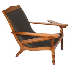 Silla de jardinero angloindia de teca con brazos extensiblesSiglo XIX