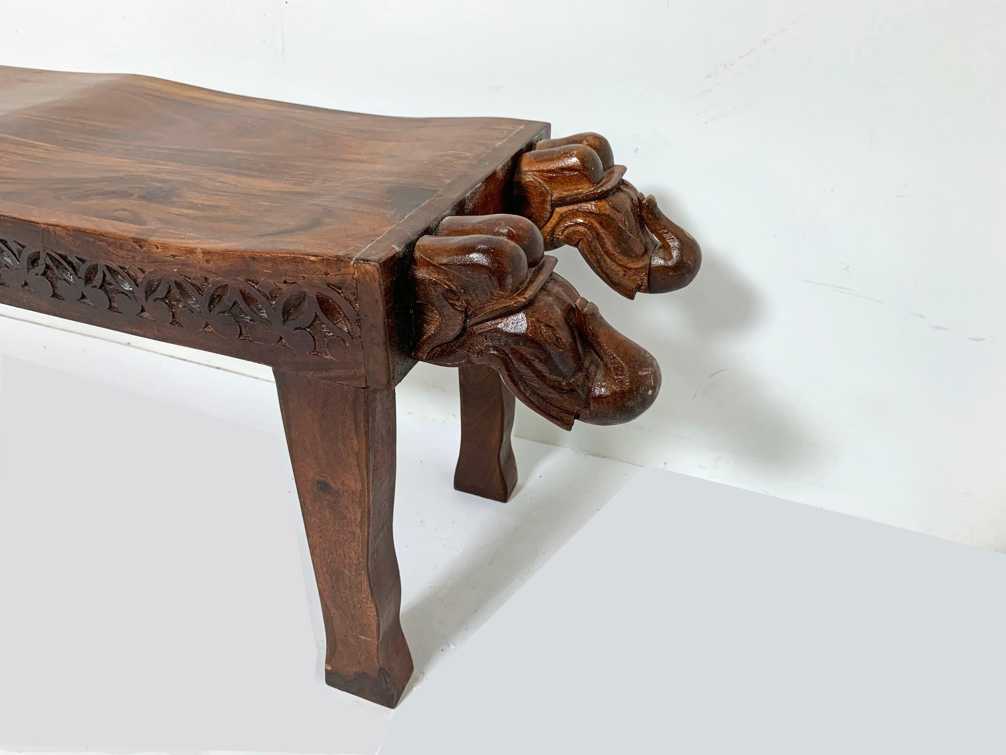 Anglo-Indian Three-Seat Bench with Decorative Elephant Head Carvings circa 1970s In Good Condition In Peabody, MA