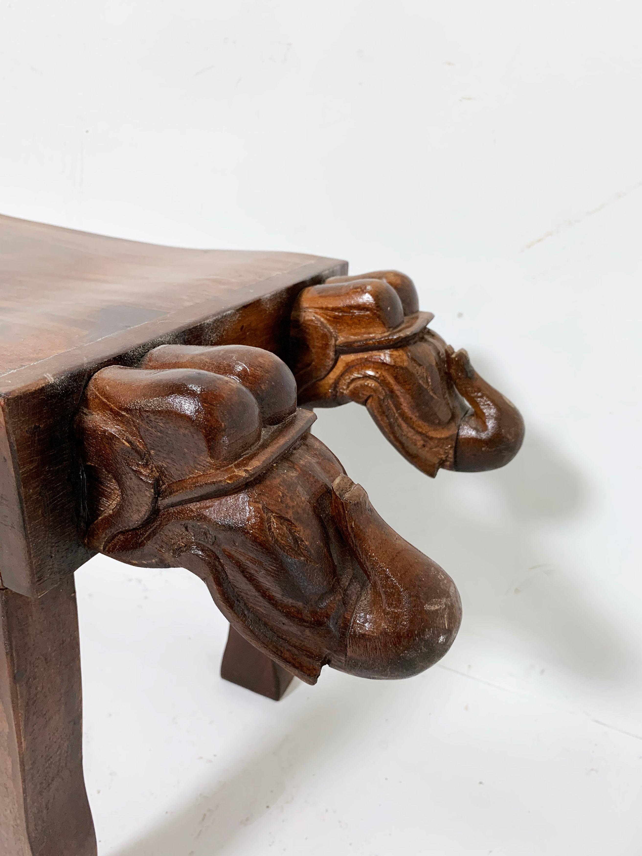 Late 20th Century Anglo-Indian Three-Seat Bench with Decorative Elephant Head Carvings circa 1970s
