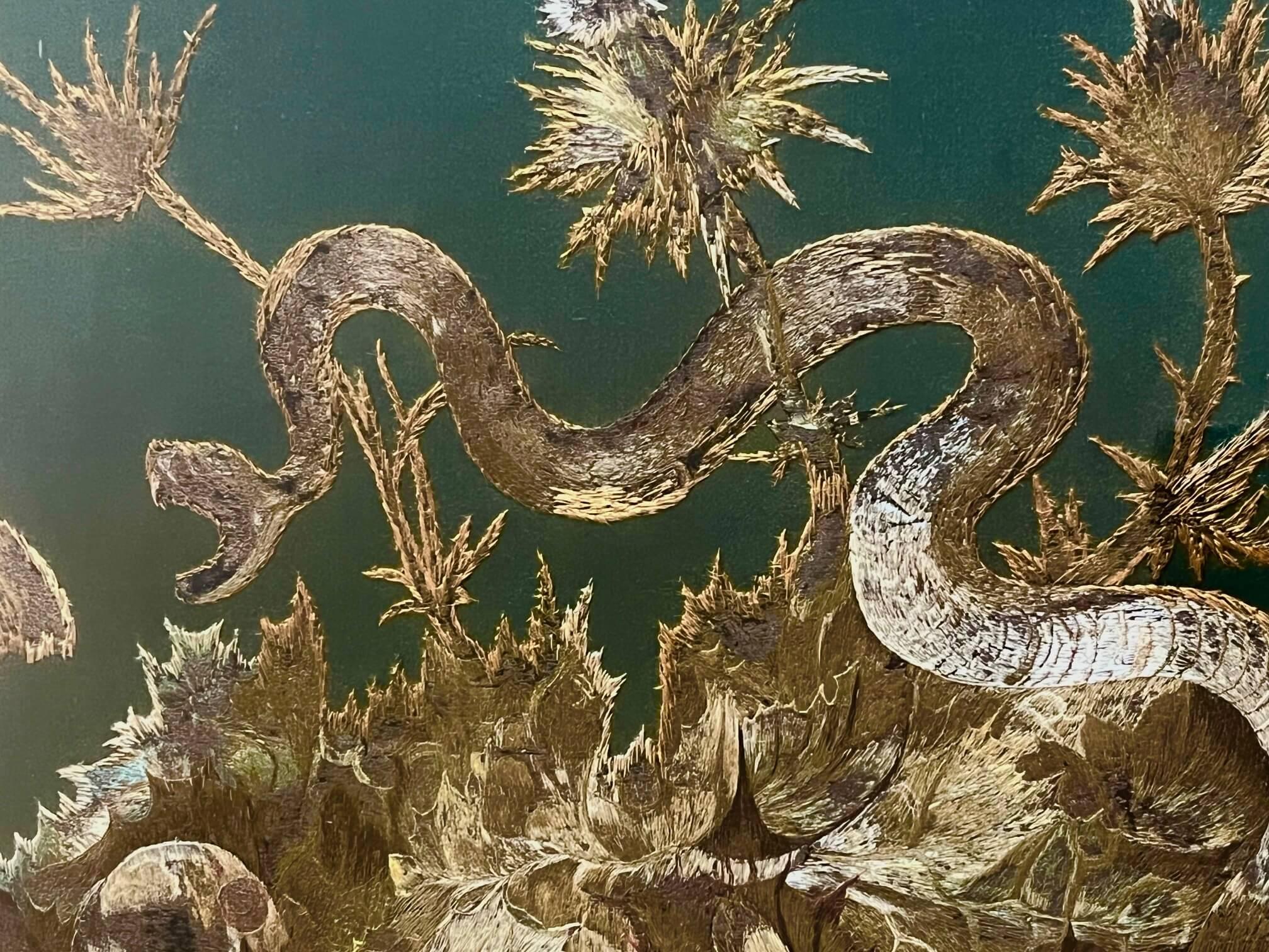 An exquisite and rare large scale circa 1840 zoological silkwork embroidery picture of native Indian reptiles and amphibians feeding on butterflies in native flora and fungi, depicting a striking Russell's viper, a turtle, a frog, and a young
