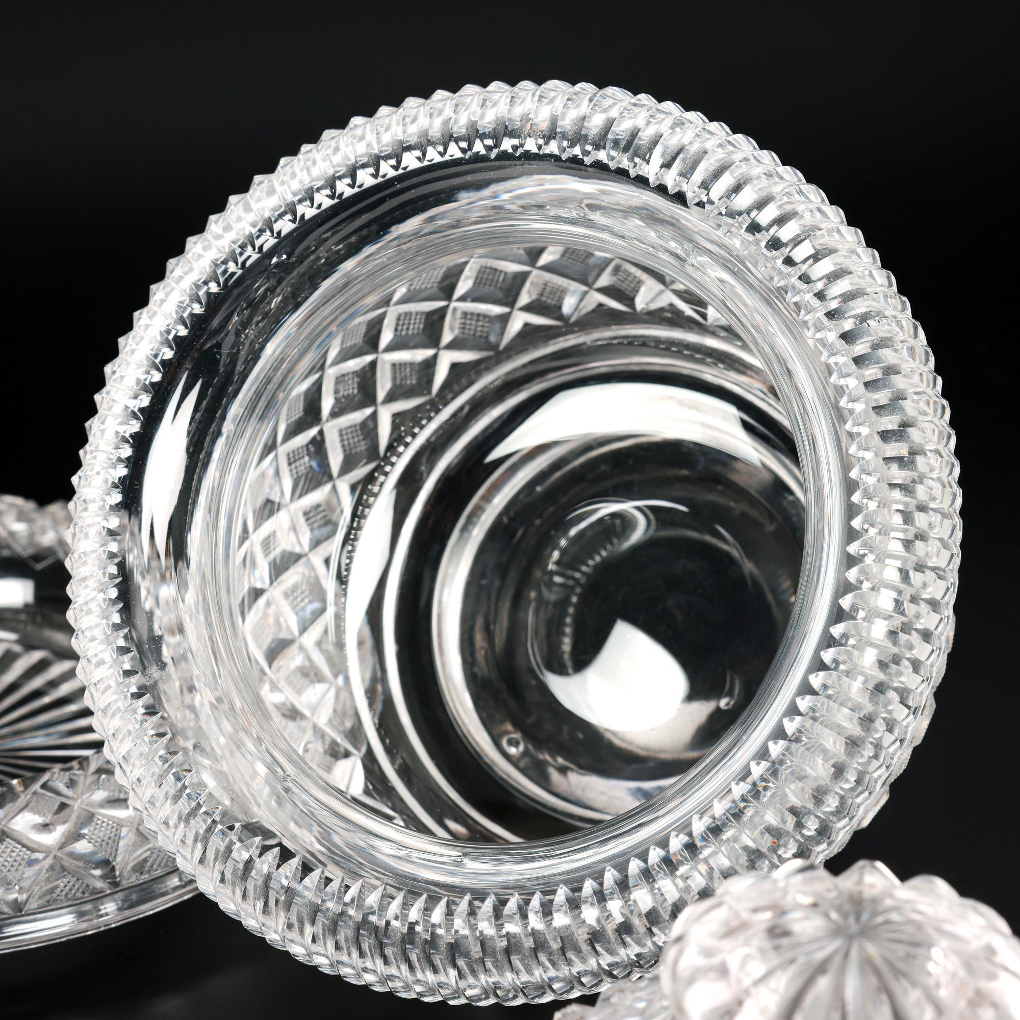 From a private collection from a prestigious London residence, we are pleased to offer this exceptional Regency Anglo-Irish cut glass covered bowl with matching stand dating from the early 19th century. The cut glass bowl of wide rounded shape has a
