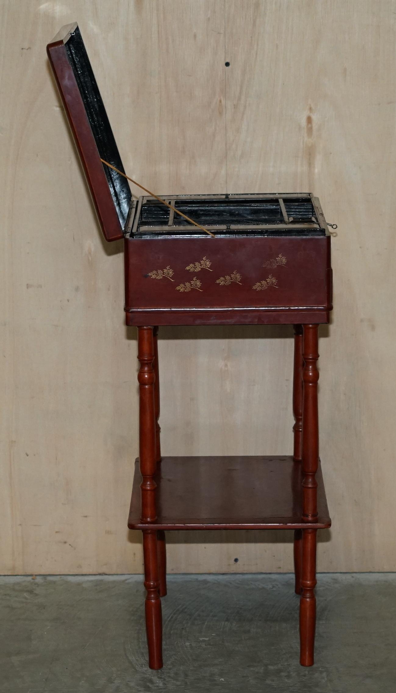 Anglo Japanese Red Lacquer Sewing Table with Famboo Legs with Fitted Interior For Sale 14