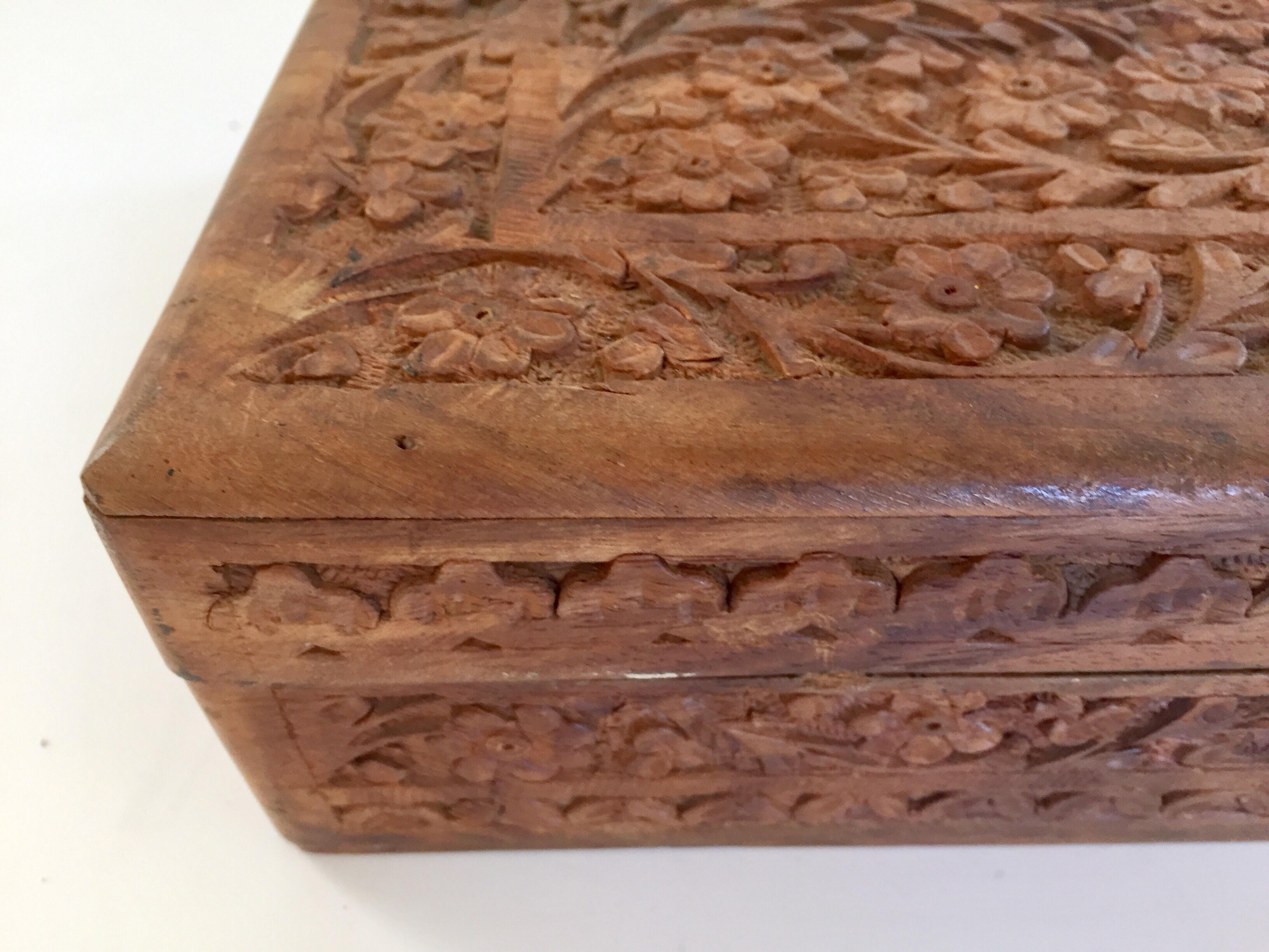 large carved wooden box