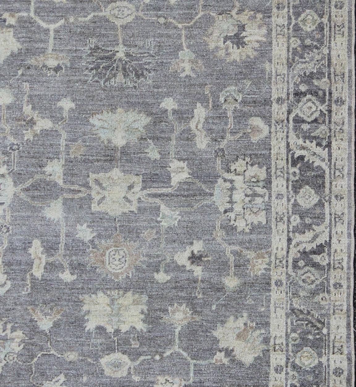 Shades of gray Gallery Angora Ushak rug from Turkey, rug AN-123686, country of origin / type: Turkey / Angora Oushak.

Measures: 6'1 x 11'3 

From our Angora collection, this piece is made with a combination of angora and old wool. Featuring all