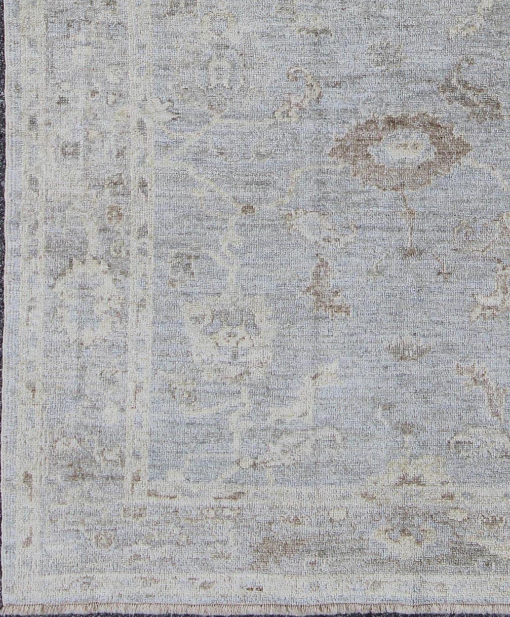 Shades of light blue, silver, taupe and cream Gallery Angora oushak rug from Turkey, rug AN-123329, country of origin / type: Turkey / Angora Oushak.

From our Angora collection, this piece is made with a combination of angora and old wool.