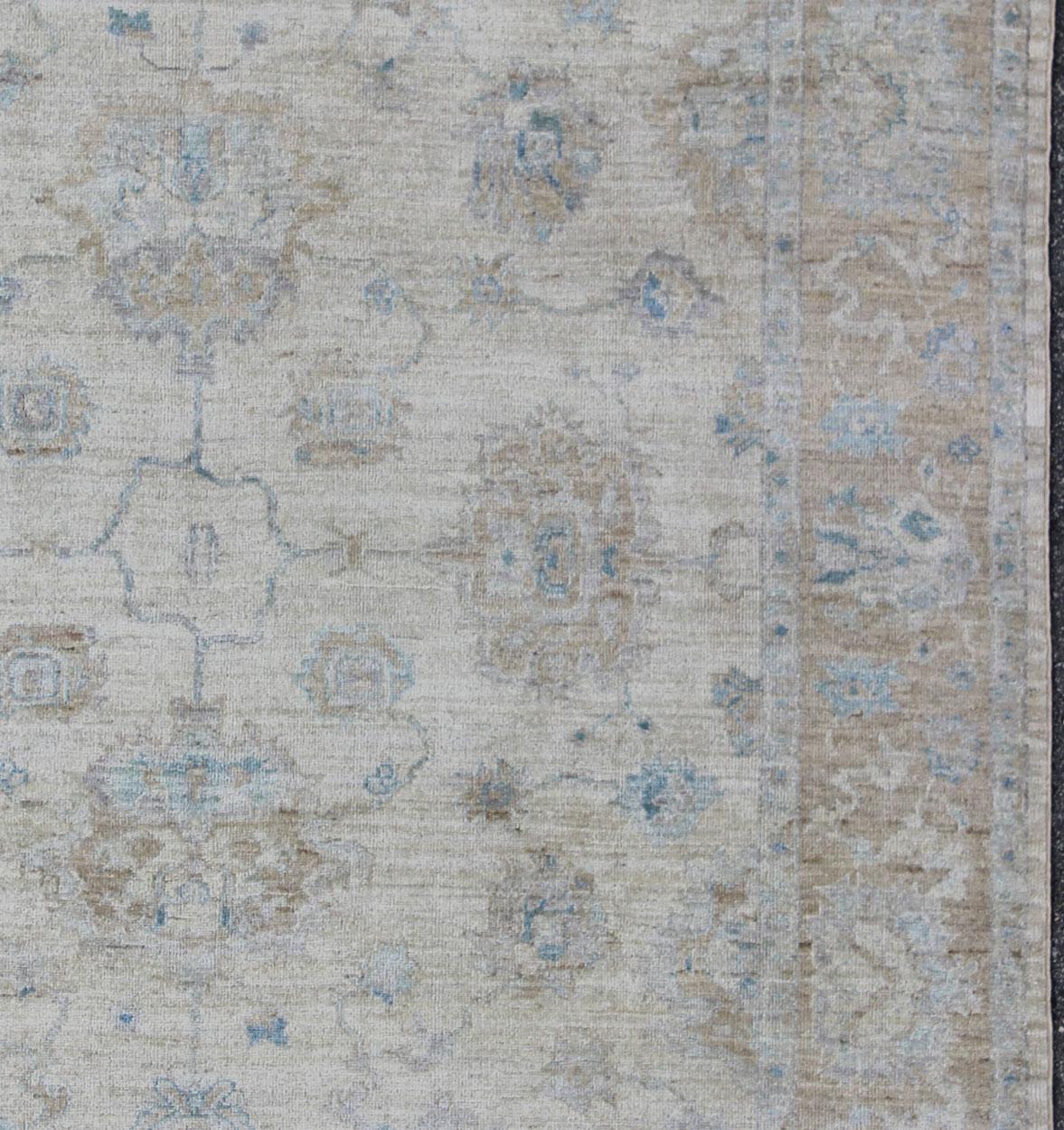 Blue, Gray, cream, taupe, and light blue Angora rug from Turkey, rug AN-123666, country of origin / type: Turkey / Angora Oushak

Measures: 9'4 x 11'8 

From our Angora collection, this piece is made with a combination of angora and old wool.
