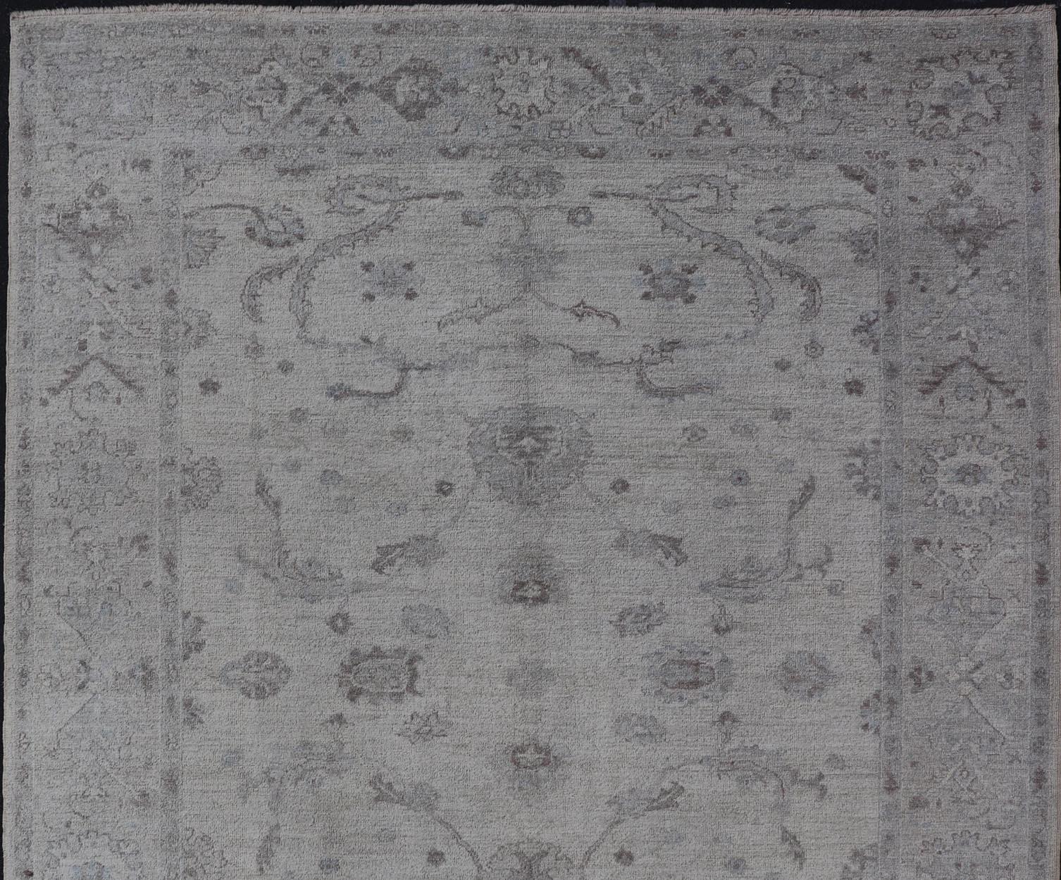 Blue, grey, cream, taupe, and light blue Angora rug from Turkey, rug AN-123666, Keivan Woven Arts / country of origin / type: Turkey / Angora Oushak

Measures: 10'2 x 13'10.