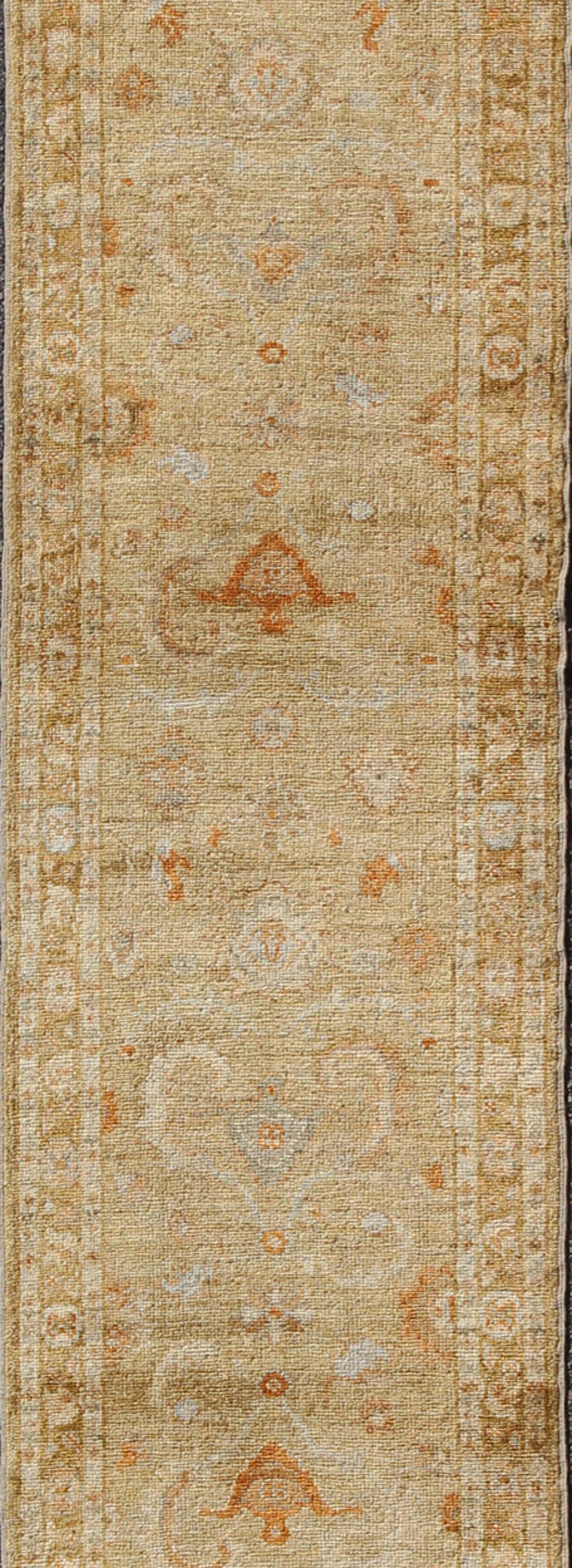 Turkish Oushak Angora runner with classic motifs and Transitional design, rug AN-97762, country of origin / type: Turkey / Oushak.

This Angora Oushak runner from Turkey features a unique golden color background, green, rust red, light blue and