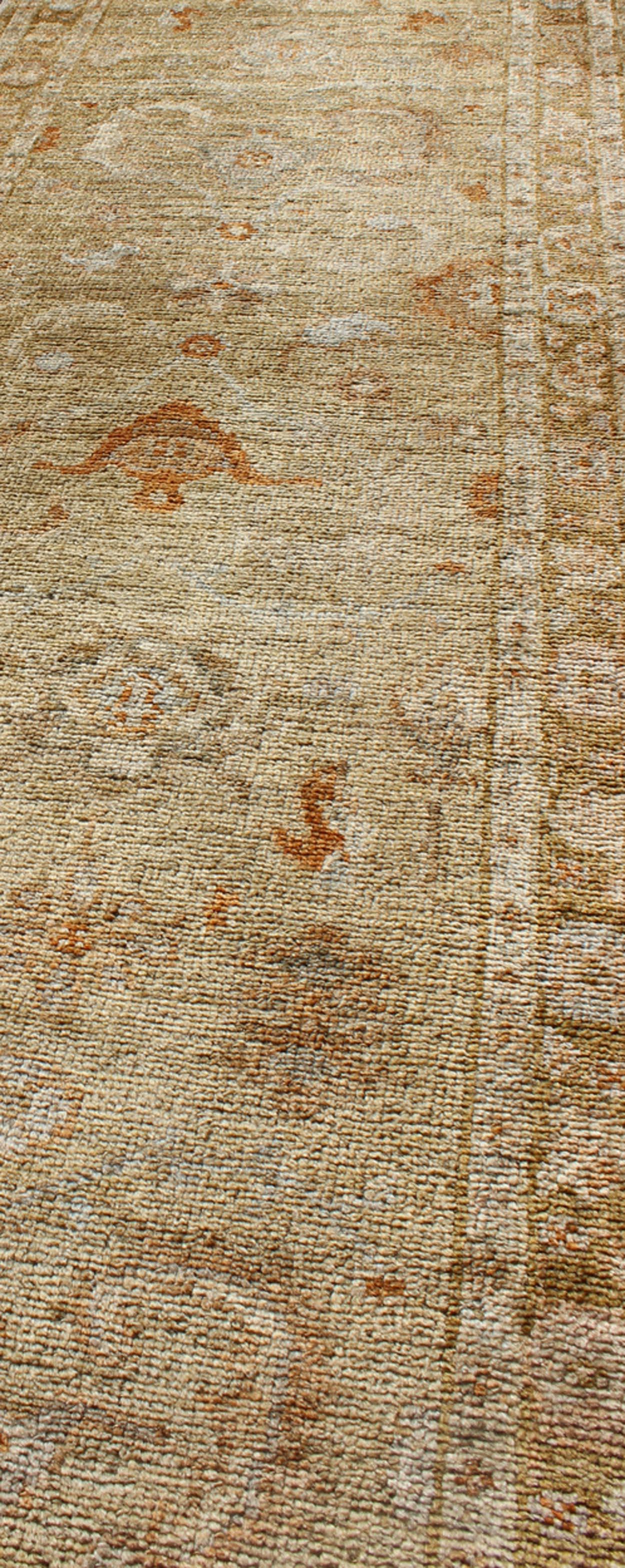 Angora Oushak Turkish Runner with Classic Design in Gold Background In Good Condition For Sale In Atlanta, GA