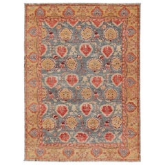 Angora Turkish Oushak Rug in Light Steel Blue Background, Gold, Orange Red