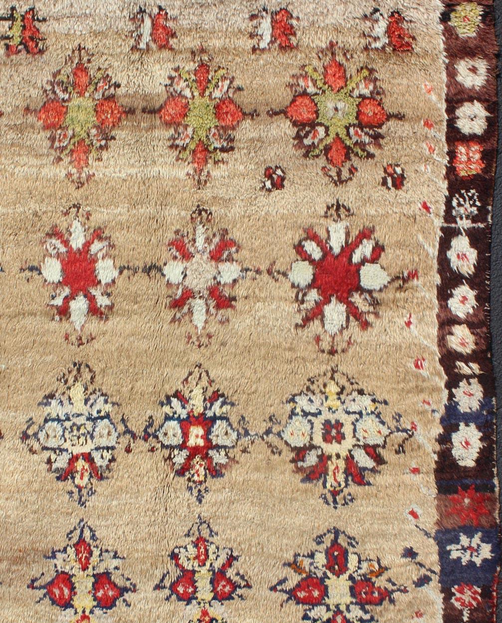 Angora Turkish Tulu Carpet with Colorful Floral Designs Set on Sand Field In Good Condition For Sale In Atlanta, GA