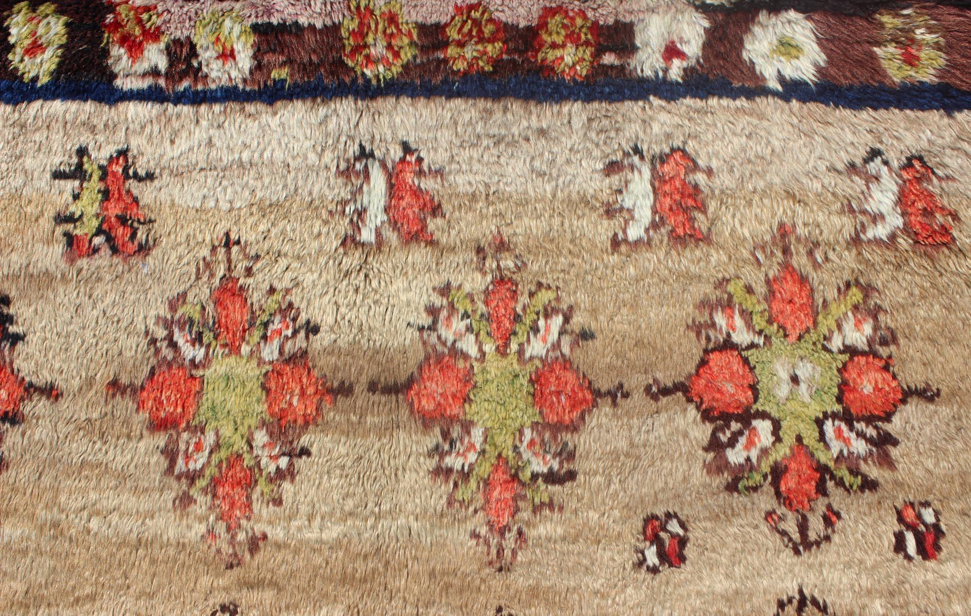 Wool Angora Turkish Tulu Carpet with Colorful Floral Designs Set on Sand Field For Sale
