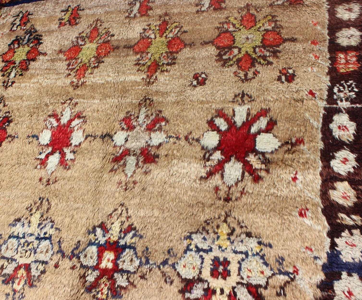 Angora Turkish Tulu Carpet with Colorful Floral Designs Set on Sand Field For Sale 2