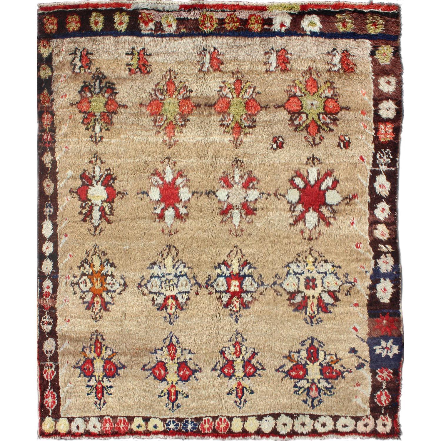 Angora Turkish Tulu Carpet with Colorful Floral Designs Set on Sand Field For Sale