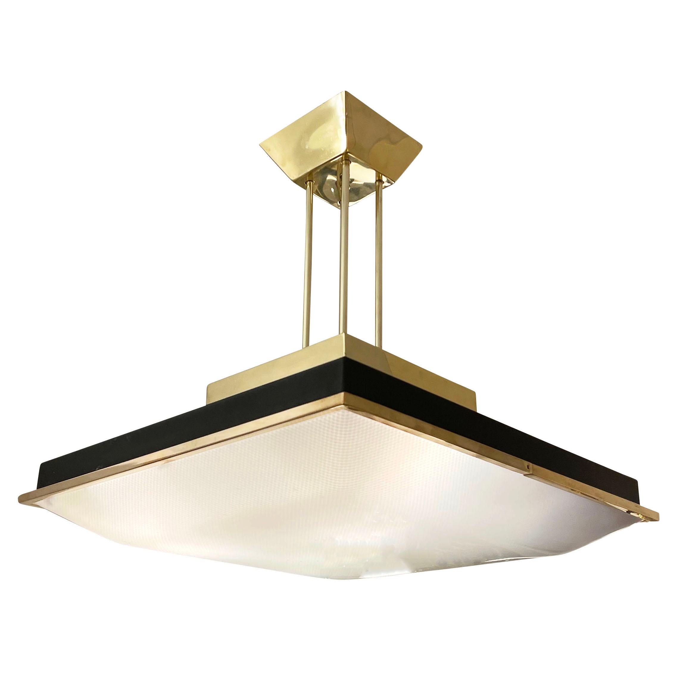 Angular mid-century Italian chandelier with a square Perspex shade. Elevating the piece are the brass rims and the canopy with its distinctive fours stems. Holds six candelabra sockets. Can also be used as a flush mount with the removal of the
