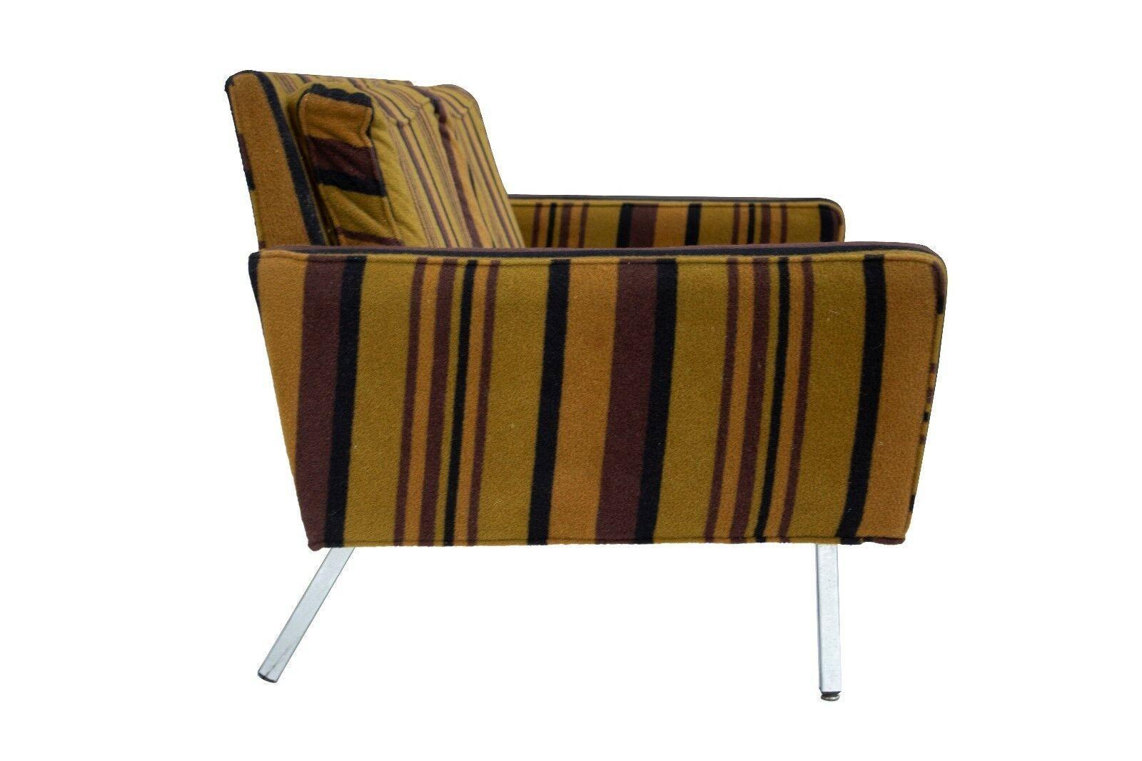 USA, 1971
Angular Loveseat in a fantastic wool stripe made by Wolverine Furniture. The chrome legs are long and angled; the front two legs each have leveling feet. This would work very nicely at the foot of a bed. 
CONDITION NOTES: This sofa has