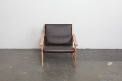 Angular Solid Maple Frame Lounge Chair Clad in Chocolate Brown Leather