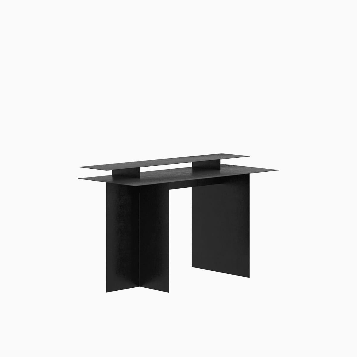 Conceptualized in 2023 by Leonardo Floresvillar, and crafted by hand with galvanized aluminum, coated with matte powder coating. 
The Ángulo Desk  was designed with two surface heights to work comfortably on a computer at your studio or at your home