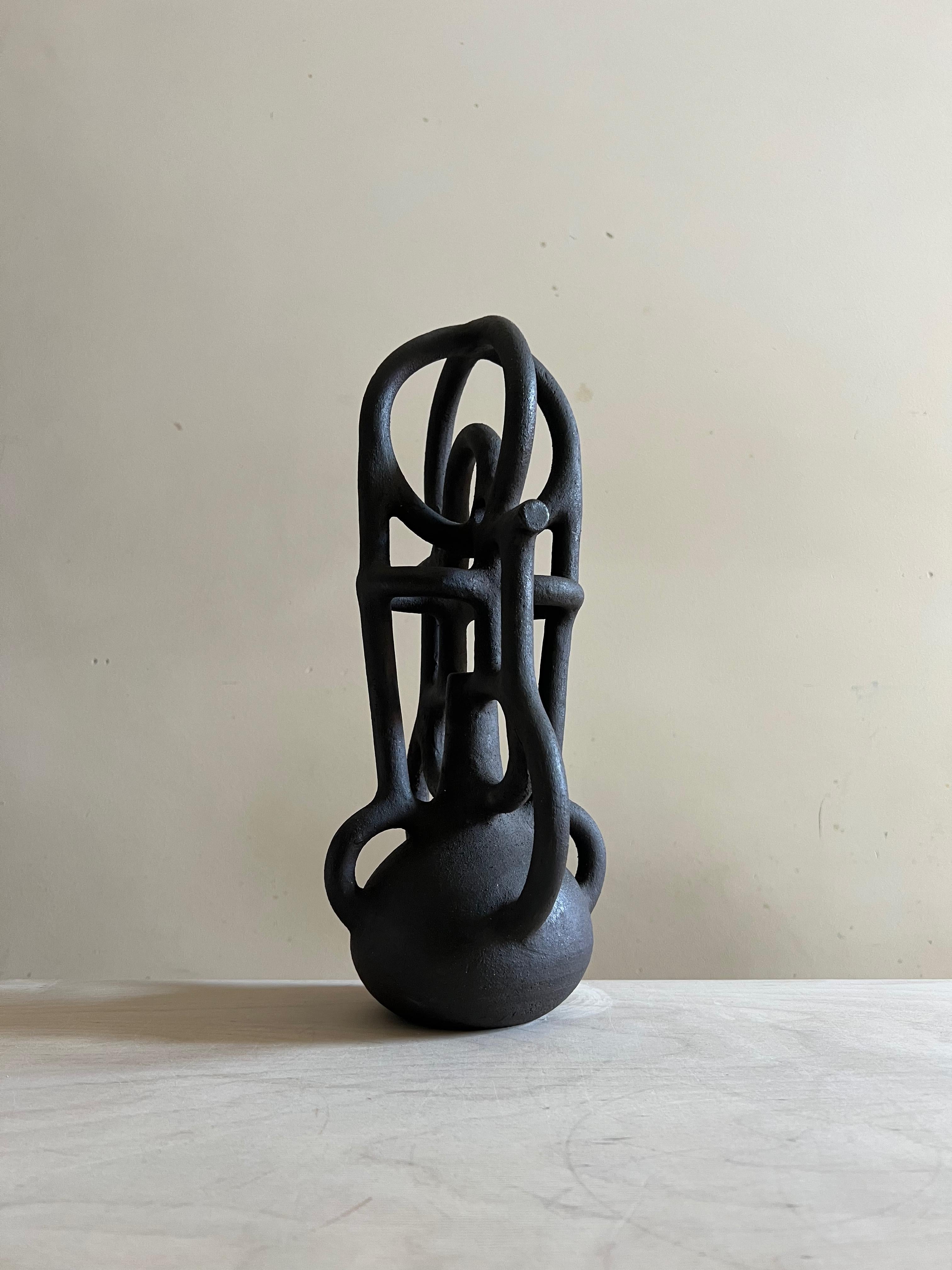 Inspired by architecture and imagined civilizations, these handmade sculptures evoke strength, stability, and timelessness. Each earthy, one of a kind piece becomes a symbol—a fortress, an altar, a relic of unknown rituals. The artist plays with