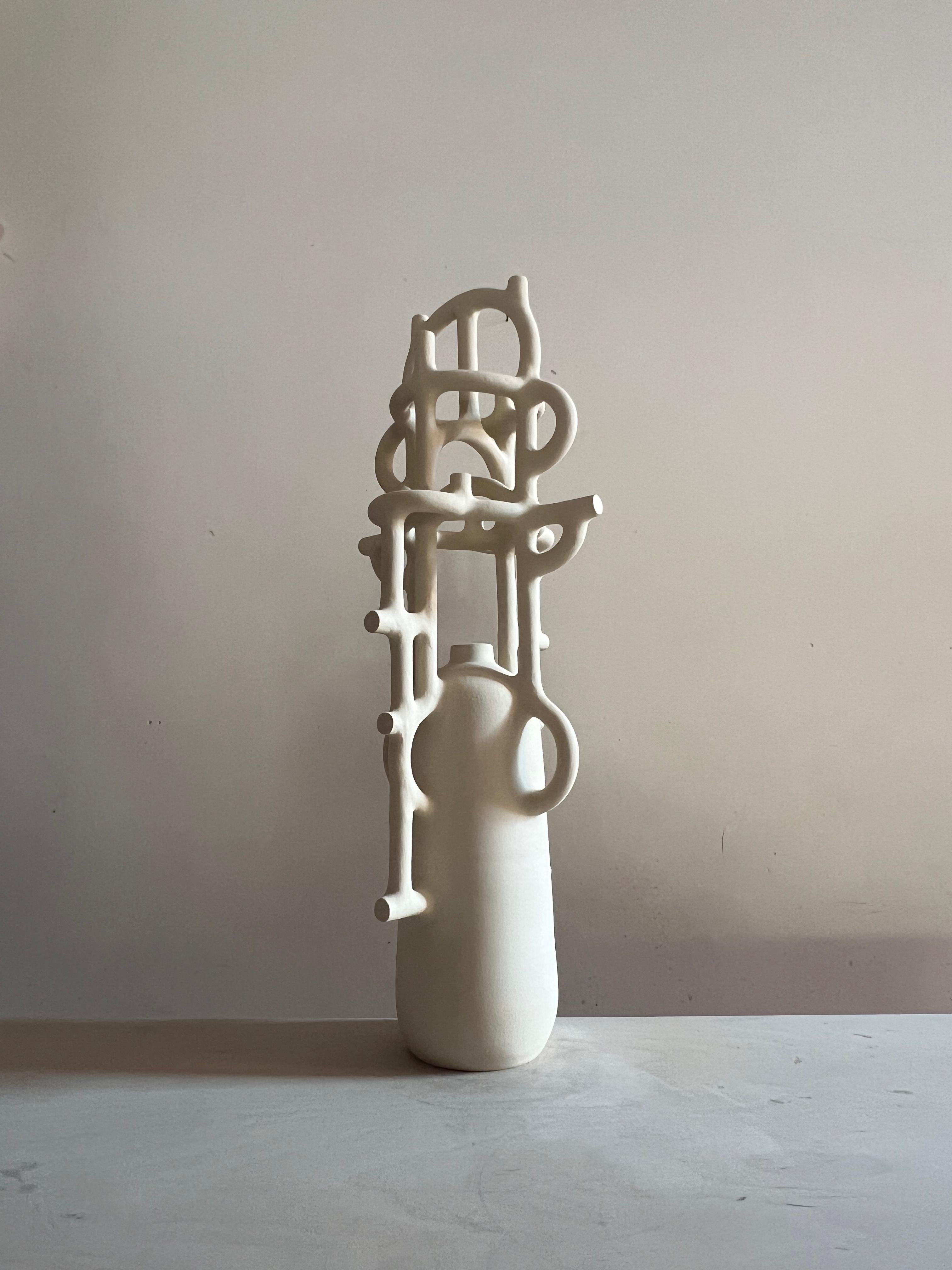 Inspired by architecture and imagined civilizations, these handmade sculptures evoke strength, stability, and timelessness. Each earthy, one of a kind piece becomes a symbol—a fortress, an altar, a relic of unknown rituals. The artist plays with