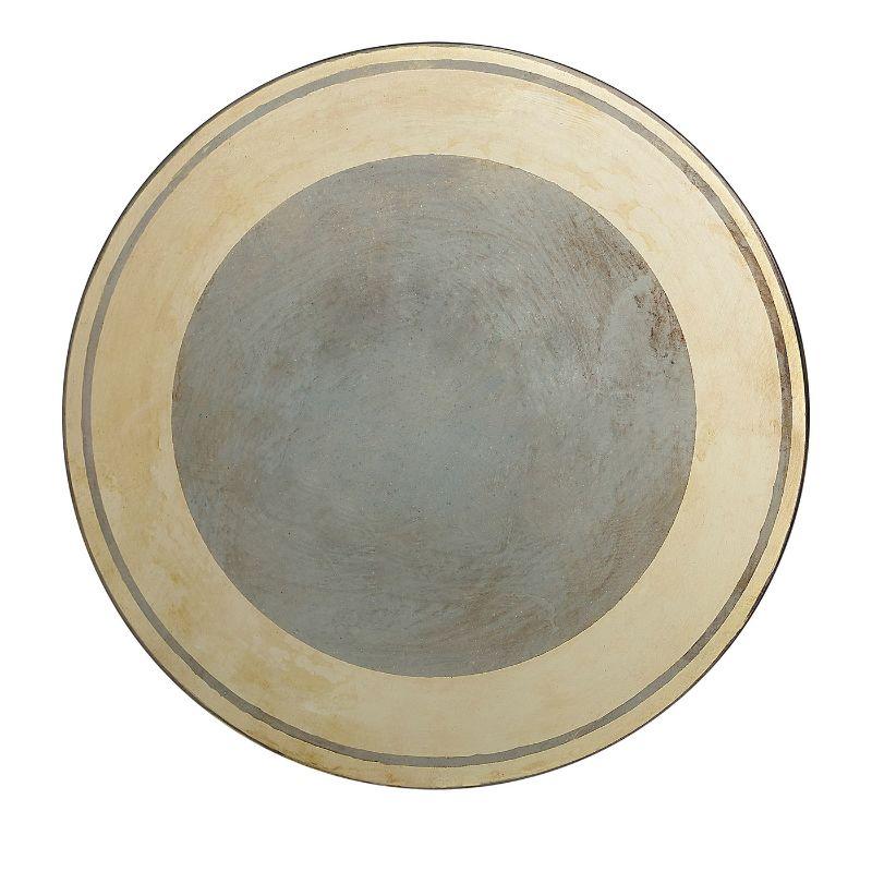 A masterful use of chemical reagents reveals the nuanced, concentric design of this set of six brass coasters inspired by aniconism philosophy, which bans the depiction of living or supernatural creatures. The velvety material covering the back