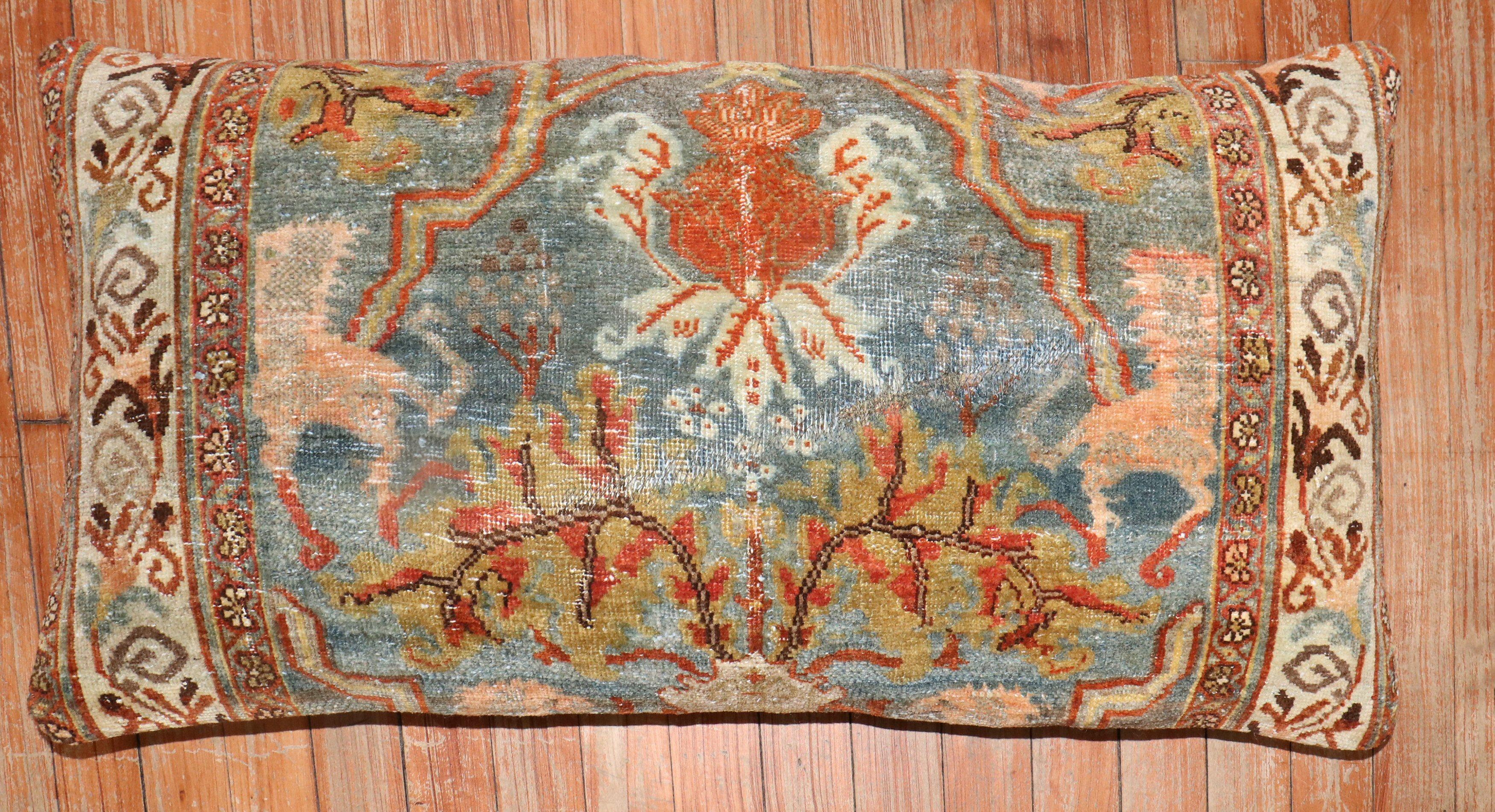 Pillow made from a late 19th century Persian Bidjar rug with a pictorial design. 

Measures: 16'' x 32''.