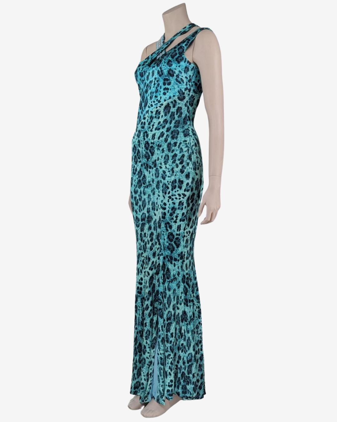 Animal print all-over maxi dress from the Fall 2012 Collection.

. Strass on the strap of the dress
· Cross strap Neckline
· Animal Print
. Mermaid shape
 

Fits M / Tag 42IT 38FR

Flat measurements : 

Breast : 44 cm
Waist : 35 cm
Hips : 45
