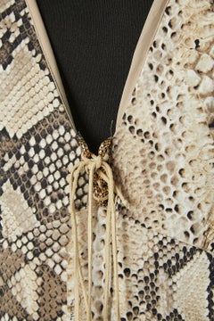 Animal print jersey dress with gold metal snake detail on bust Roberto Cavalli